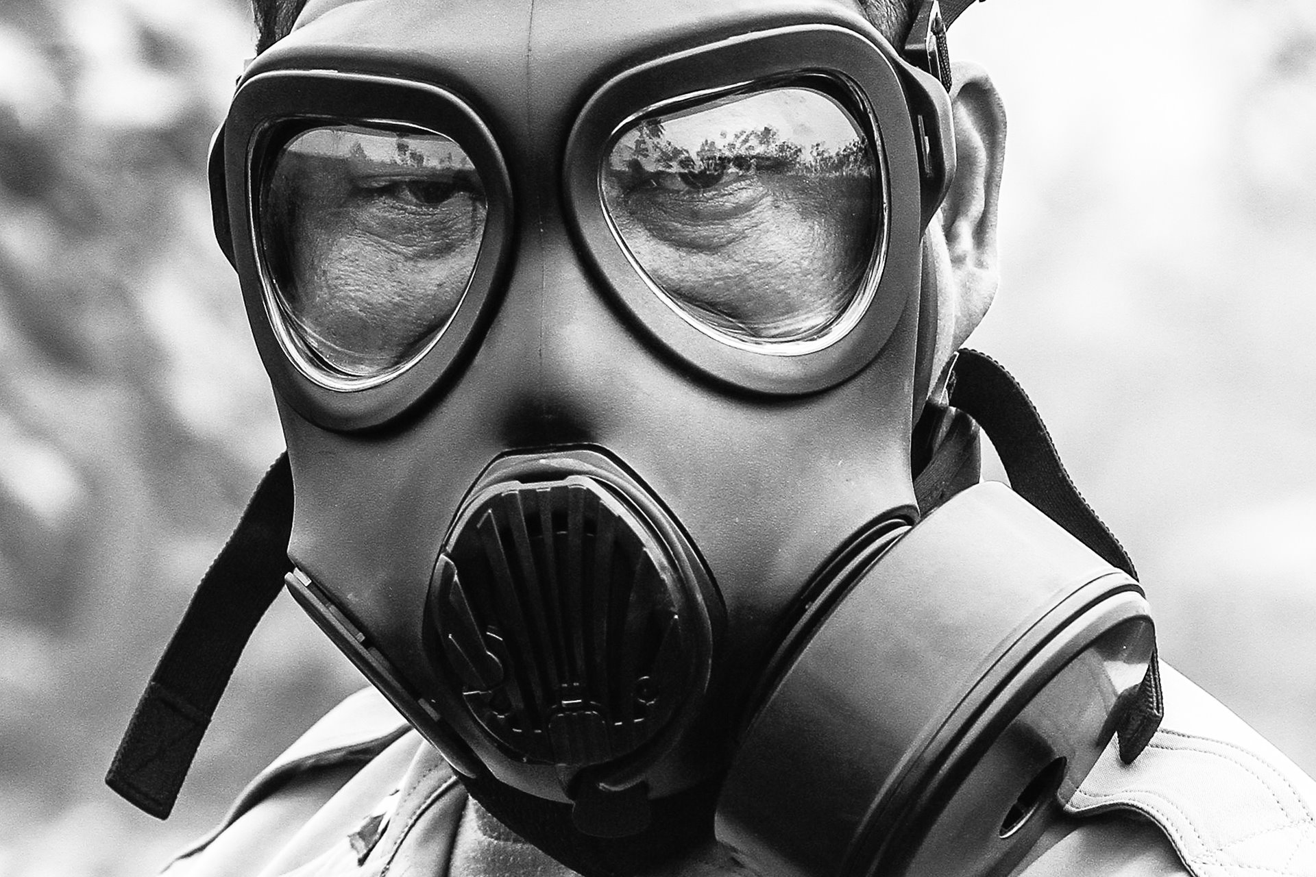 <p>A police officer wears a gas mask as protection against smoke from a peatland fire in Ogan Komering Ilir, South Sumatra, Indonesia.</p>
