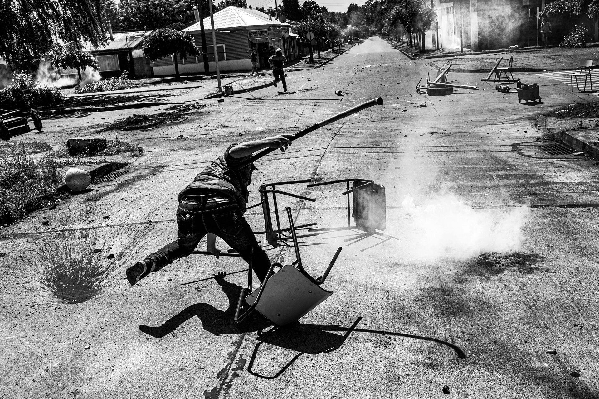 After they occupied the school to protest the killing of community leader Camilo Catrillanca, students of the Liceo Alonso de Ercilla y Zuñiga clash with police, in Ercilla, Araucania, Chile. The majority of students at the school are from Mapuche communities. They were also demanding withdrawal of the Comando Jungla (Jungle Commando), a heavily armed police division charged with strengthening security in the region.