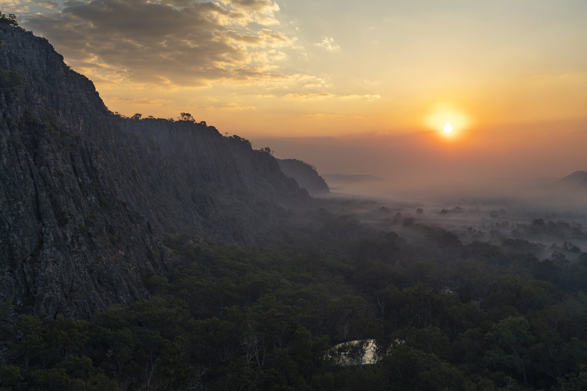 Smoke from a cool-burn fire covers Djalama Valley in West Arnhem Land, at the beginning of the dry season in Australia&rsquo;s Northern Territory.