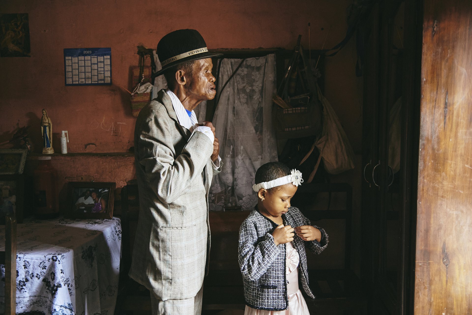 Dada Paul and his granddaughter Odliatemix get ready for church in Antananarivo, Madagascar.&nbsp;