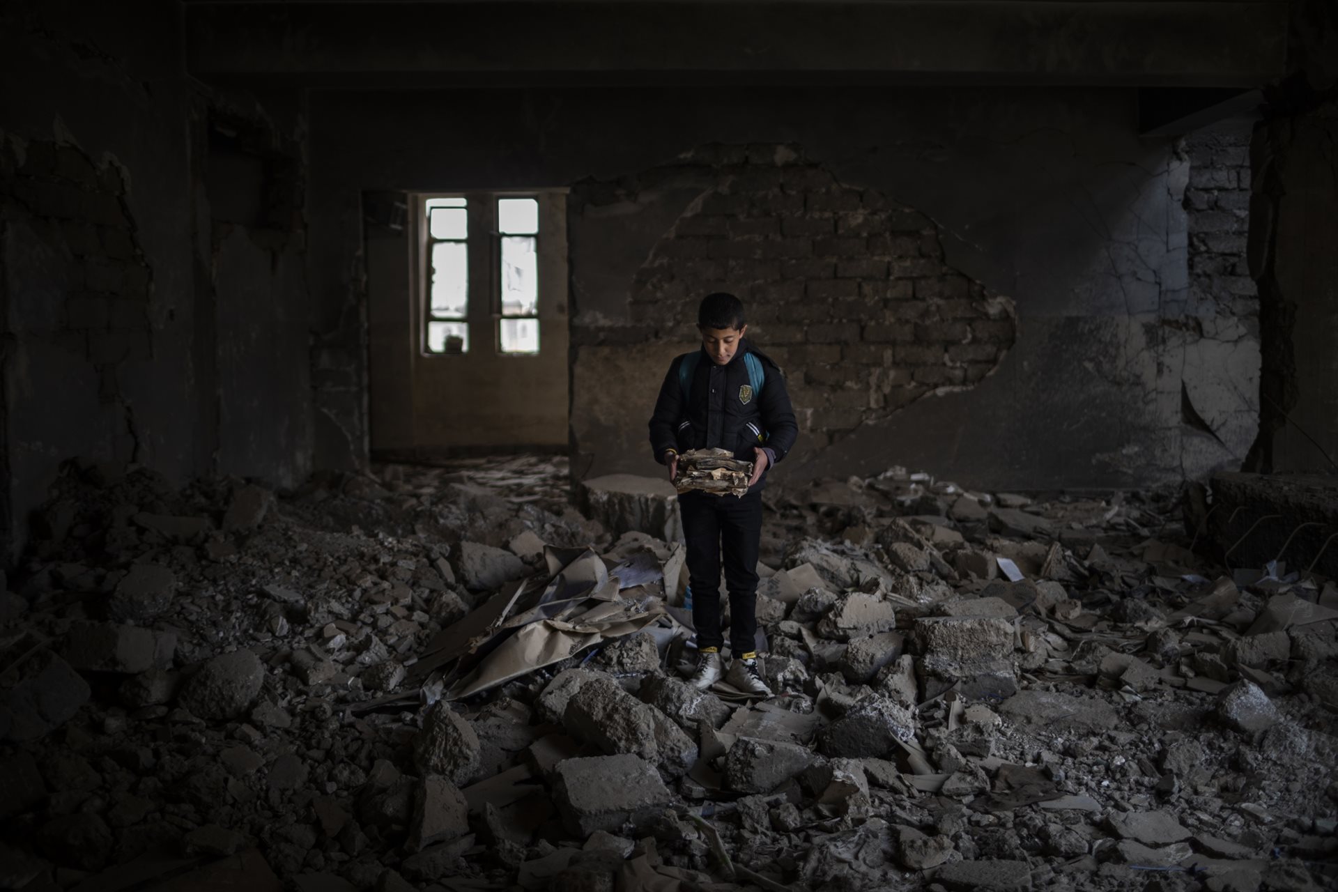 Yousef (12) dreams of becoming a police officer. His school was heavily damaged during the battle for Mosul from 2016 to 2017. Mosul, Iraq.