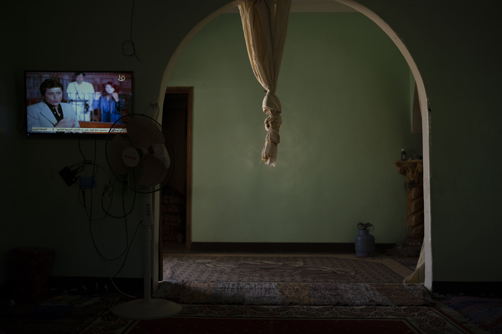 A 90s Egyptian movie plays in Hussein&rsquo;s living room in St. Catherine, South Sinai, Egypt.
