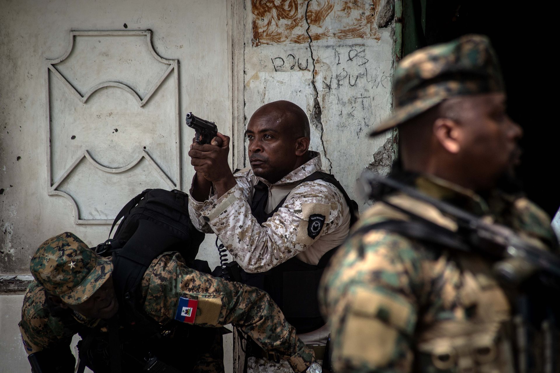 Police forces take part in an operation against powerful gangs near the National Palace in Port-au-Prince, Haiti.