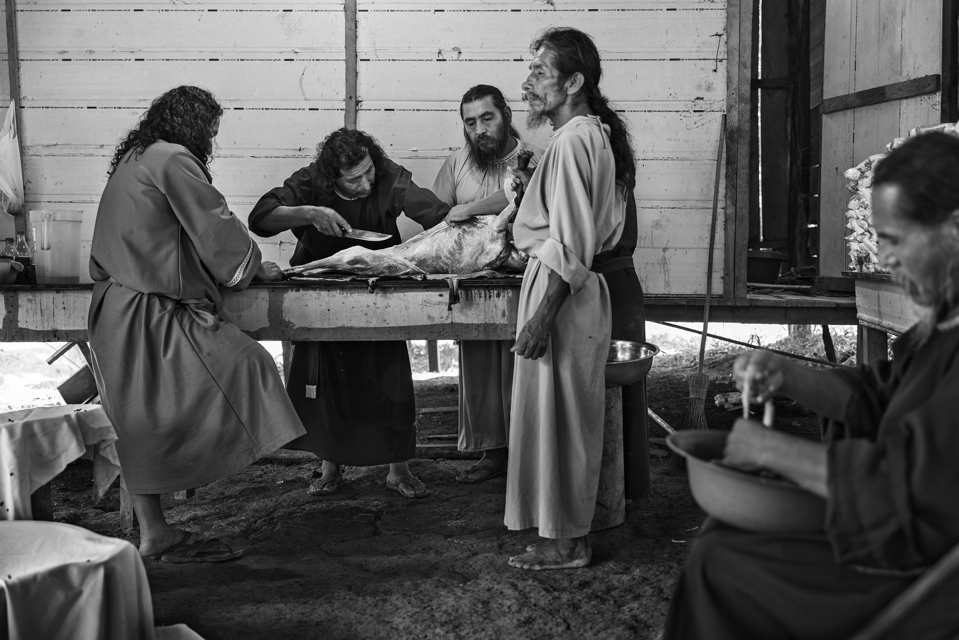 Members of the church Universal New Covenant Israelite Mission prepare a lamb for a ritual, during a retreat in rural Benjamin Constant, a Brazilian municipality located on the border with Peru. The sect, which emerged in Peru, has found an increasing membership in the region, and is already active in other Brazilian states. The growth of such sects and of evangelism in the region has had a strong impact on the way of life and culture of the traditional populations. Indigenous people&rsquo;s organizations raised concerns that these attempts to proselytize in their communities violated their constitutional right to maintain their cultural heritage and sacred practices, and threatened their safety.