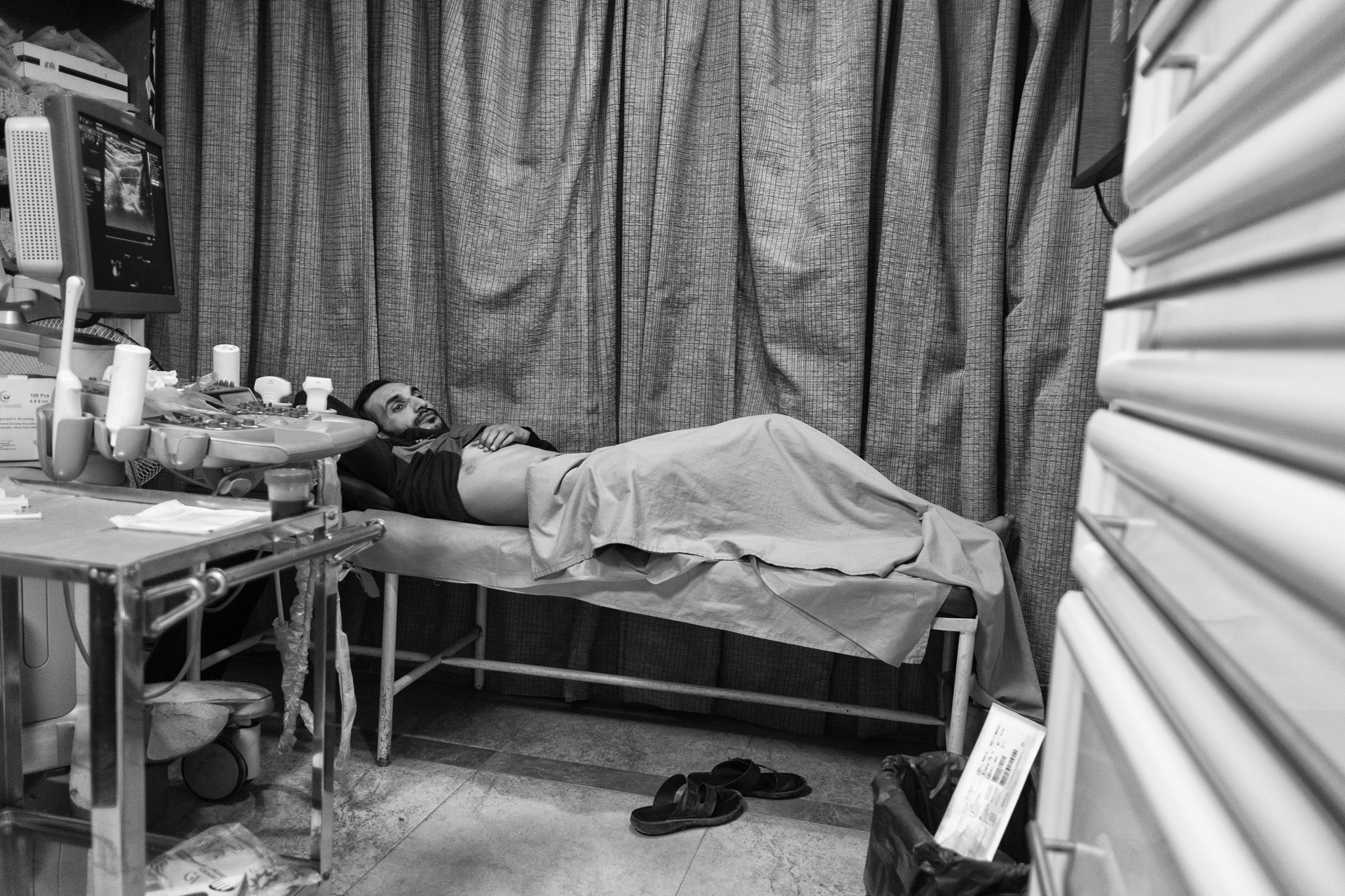 Abdelrahman prepares to have fluid removed from his lungs. Funds for his treatment were raised through this project. Moon Valley, Alexandria, Egypt.