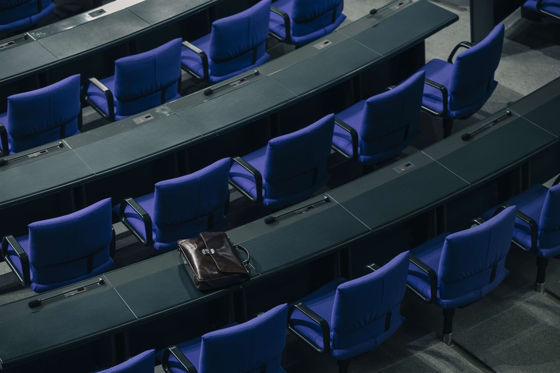The briefcase of an AfD member of parliament lies forgotten in the German Bundestag in Berlin, Germany, following the vote of no confidence in Chancellor Olaf Scholz which led to the dissolution of parliament and a 2025 general election.