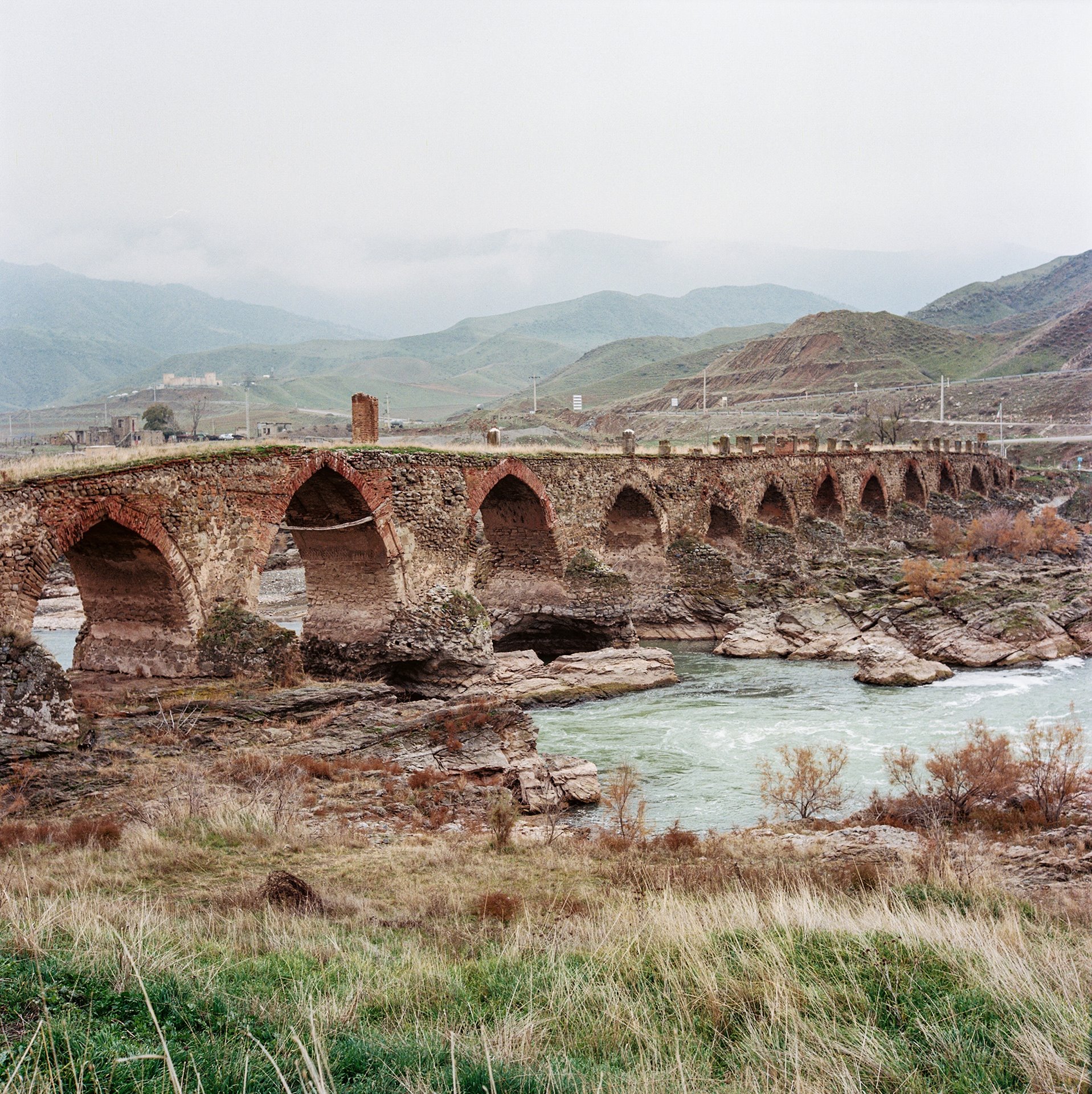 Khodaafarin Bridge located at the Azerbaijan-Iran border in the recently recaptured province of Jabrayil. Rustam Effendi used to take train journeys past this bridge on his way to Nakhchivan through Armenia, but the railway tracks were dismantled and repurposed as anti-tank traps during the war.