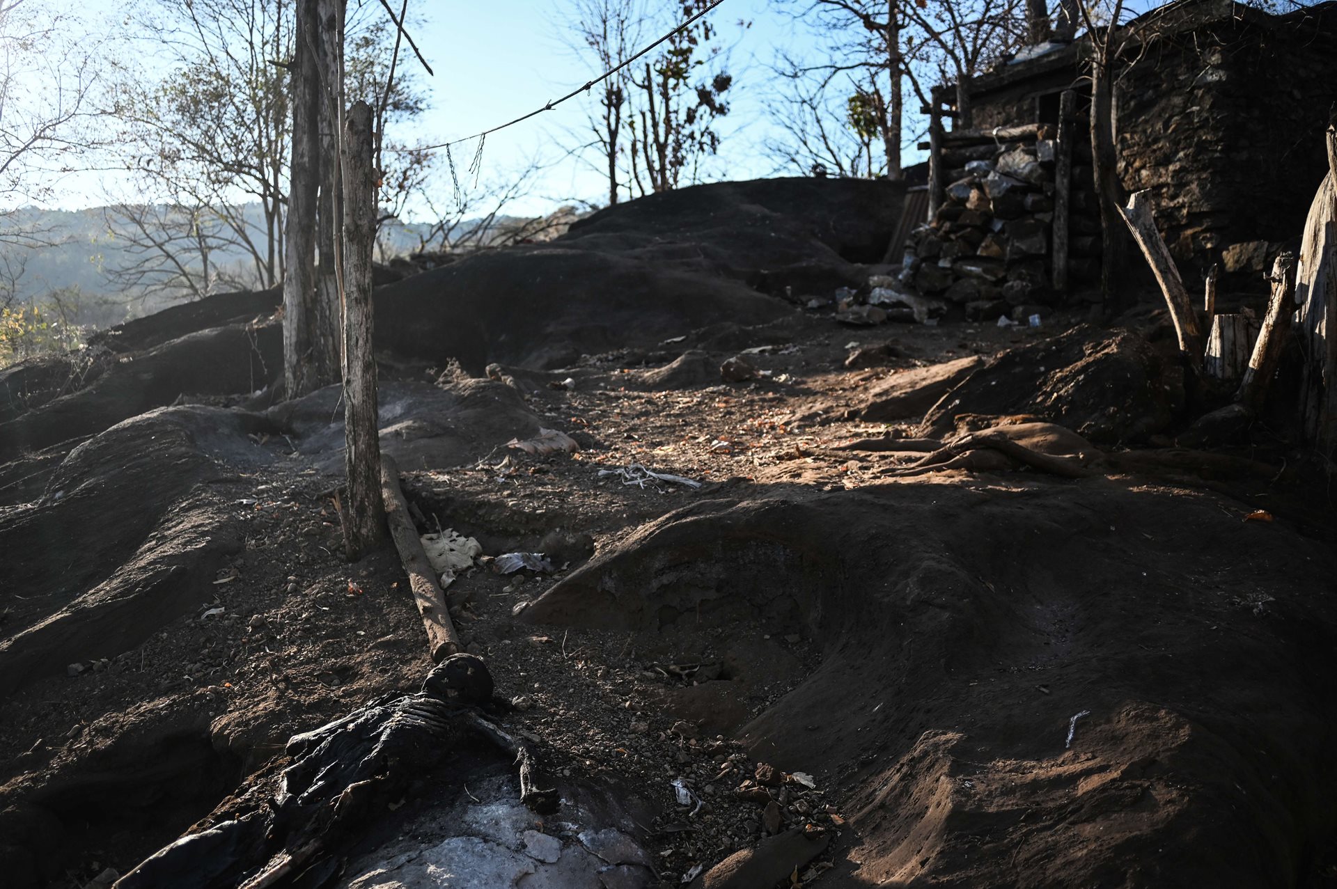 The unidentified remains of a Myanmar Army soldier lie near an overrun hillside sentry point, after fighting between the Karenni Nationalities Defence Force and junta troops in Shadaw, Kayah (Karenni) State, Myanmar.&nbsp;<br />
&nbsp;