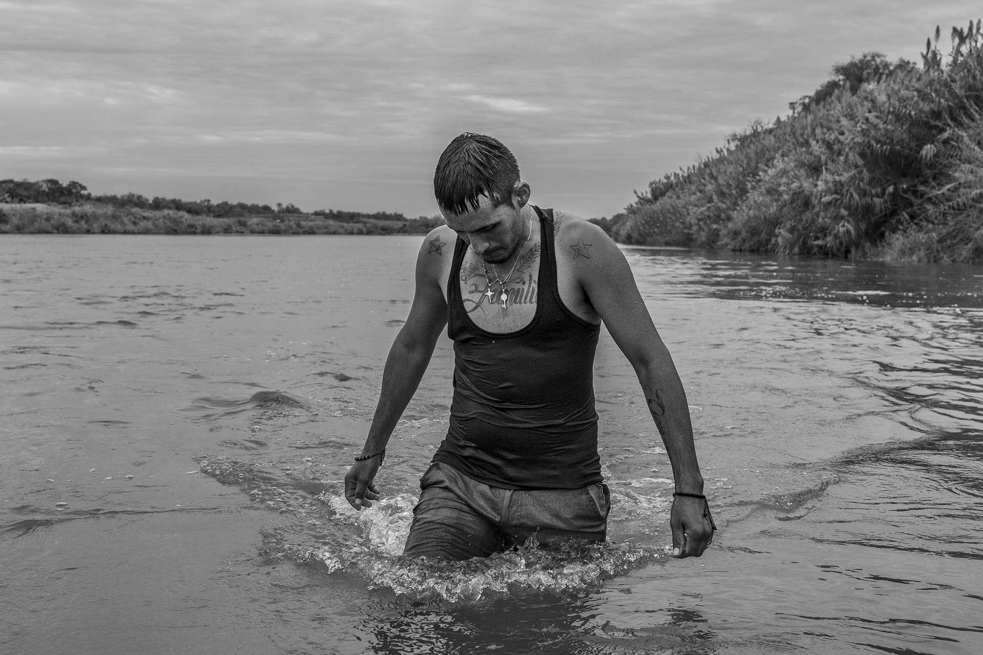Carlos Mendoza, a Venezuelan migrant, crosses the Rio Grande river to seek asylum in the United States. Piedras Negras, Mexico.