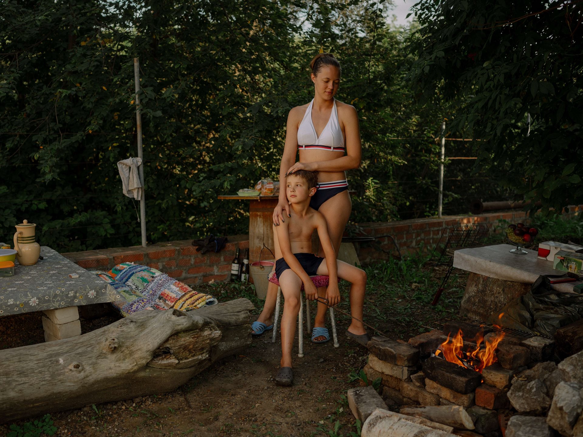 Aliona&rsquo;s sister Sanya relaxes at the family dacha (country home) in Tomsk, Russia, with her nine-year-old son. Aliona has never once talked to Sanya about the war. She doesn&rsquo;t know what Sanya thinks about the future, nor what it is like to be the mother of a son in present-day Russia.