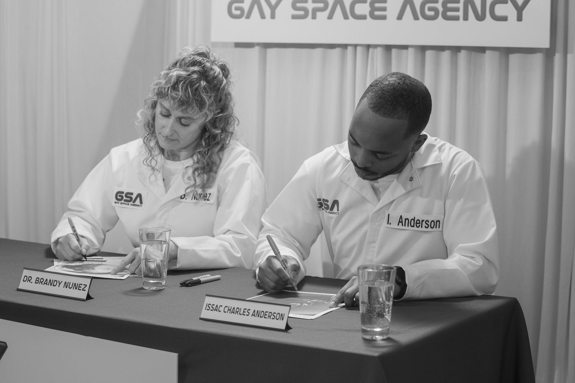 Dr. Brandy Nunez and Issac Charles Anderson, the first crew of the fictional Gay Space Agency, signing autographs in New York, United States. Dr. Nunez and Anderson are real-life LGBTQI+ aspiring astronauts, participating in civilian astronaut training with the nonprofit, Out Astronaut.