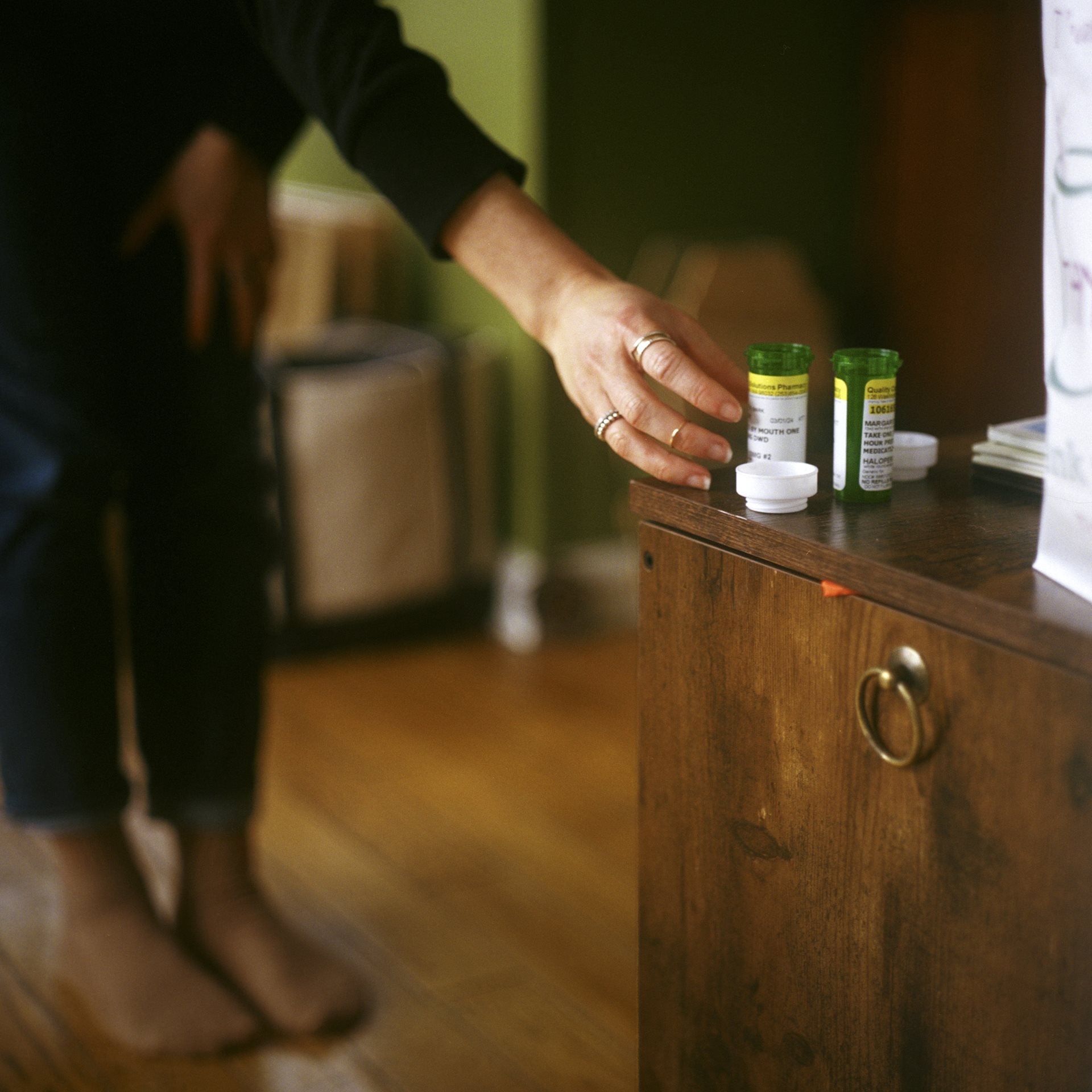 A death doula fetches pre-meds &ndash; medication to stave off nausea &ndash; for a guest. When a pharmacist delivers medication, the package includes both pre-meds and a compound specifically designed to induce death. Washington State, United States.