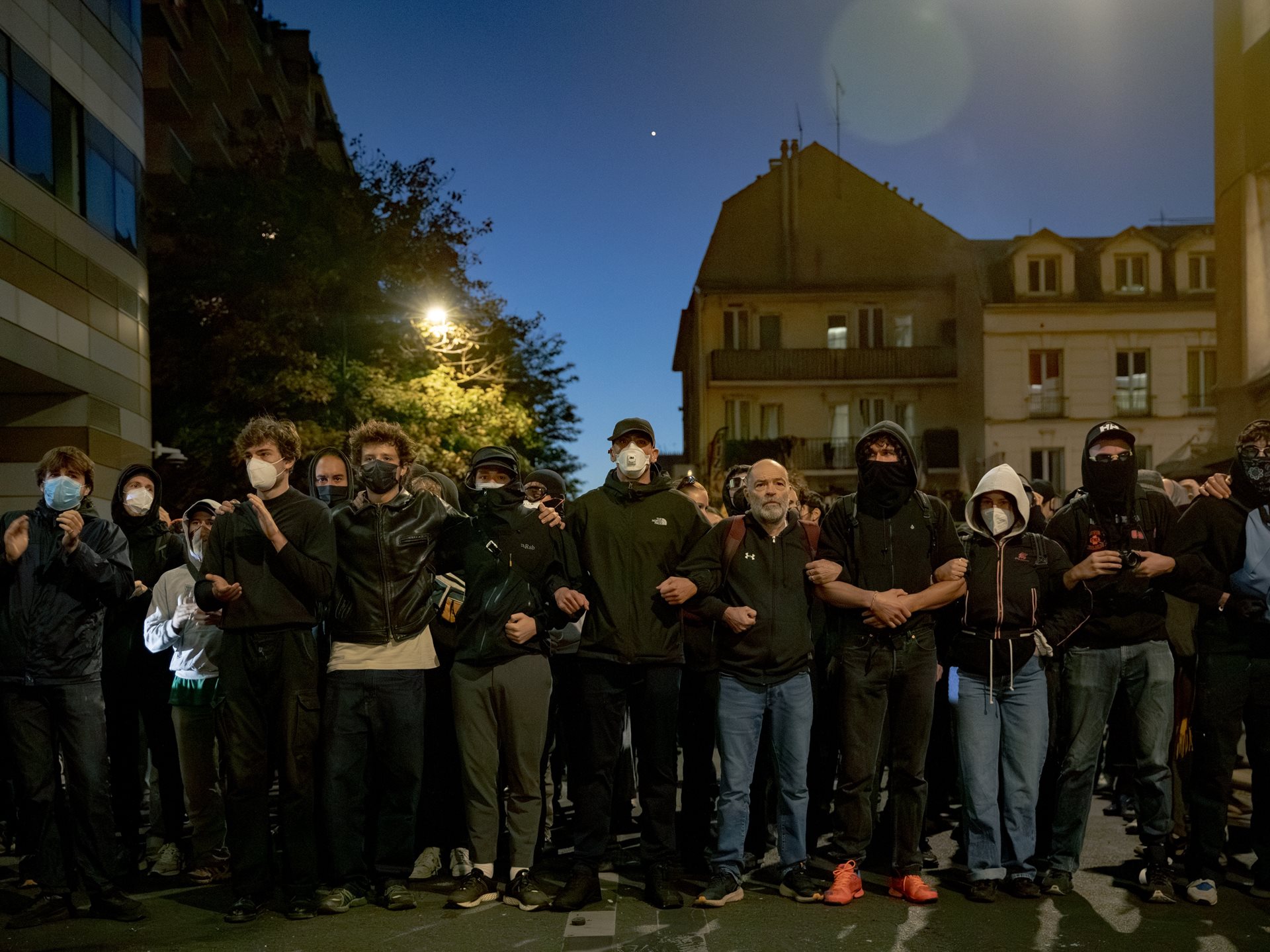 <p>Union members and protesters prepare to face a police charge at dawn during an attempt to block buses from leaving the Lagny bus depot in Paris, France, as part of the &ldquo;Bloquons tout&rdquo; citizen-led movement against the political class and proposed budget cuts.&nbsp;</p>
<br />
&nbsp;