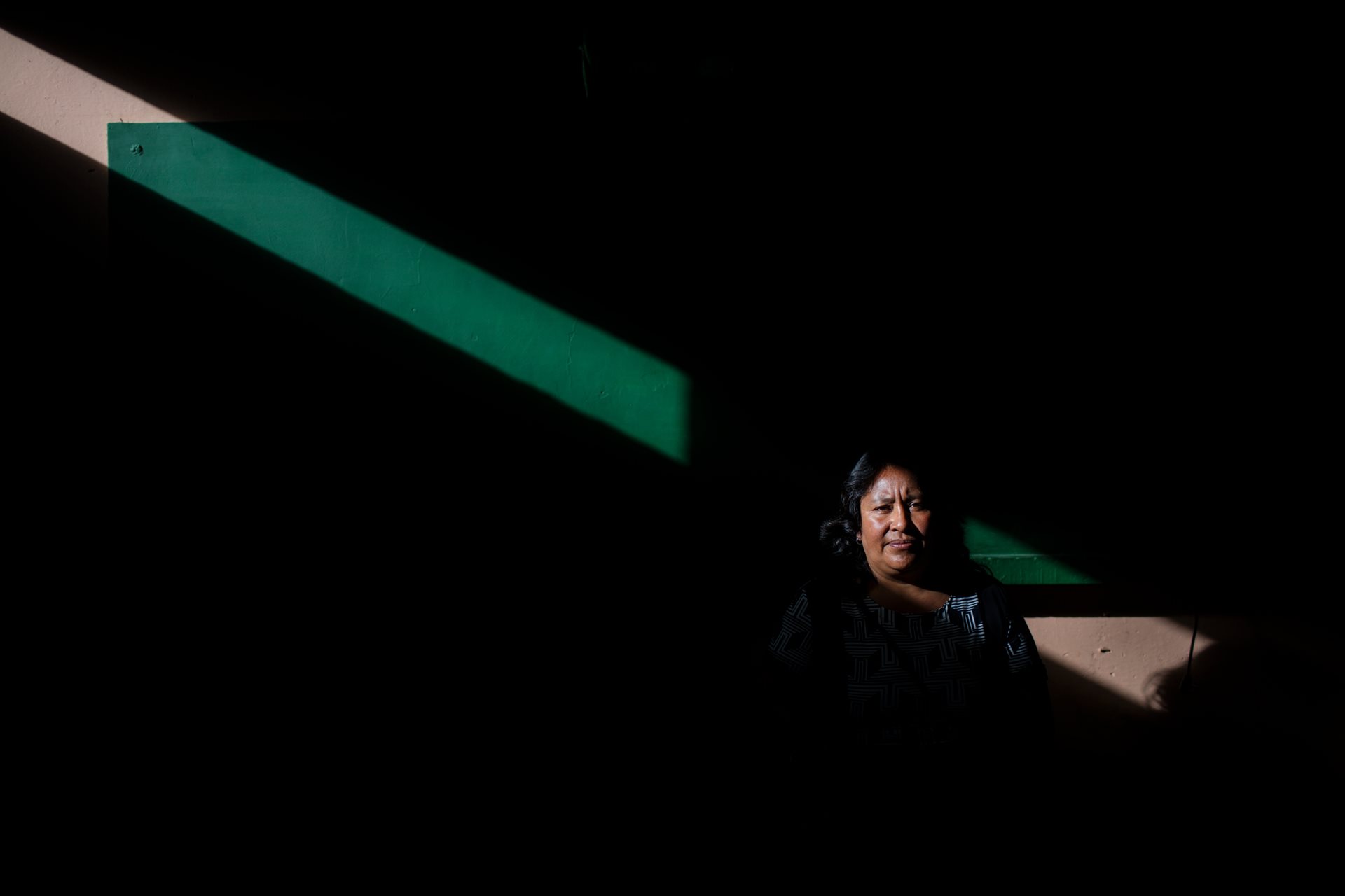 Nora Nancy, a teacher, photographed at her school in Samaniego, Colombia. In 2008, four teachers were murdered by FARC rebel forces in nearby Guachavés, forcing her to flee her home. Despite her efforts to obtain displaced status, authorities have denied her request.