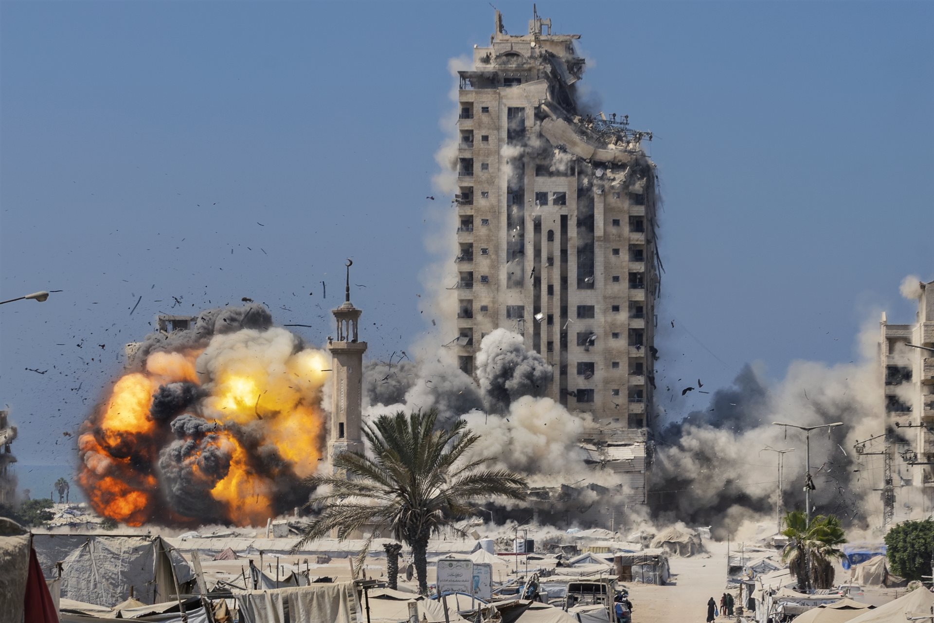 The Mushtaha Tower collapses in a military strike, amid hundreds of makeshift tents sheltering displaced Palestinians, as Israel&rsquo;s offensive on Gaza City intensified. Gaza Strip.&nbsp;
