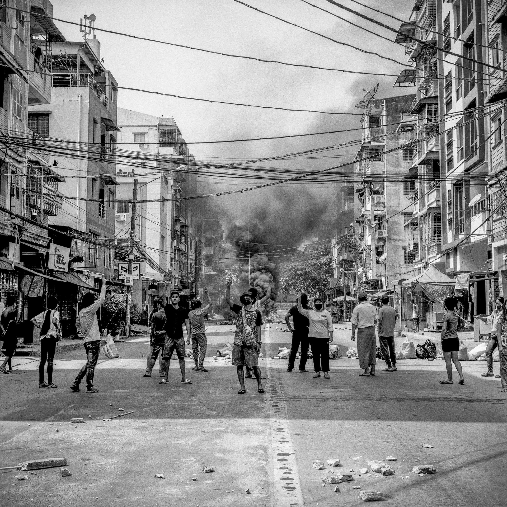 Pro-democracy protesters chant and give the three-finger salute &ndash; a symbol of resistance &ndash; during an anti-coup protest in Yangon, Myanmar. The protest came four days after 114 civilians were killed by armed forces, the deadliest day thus far.