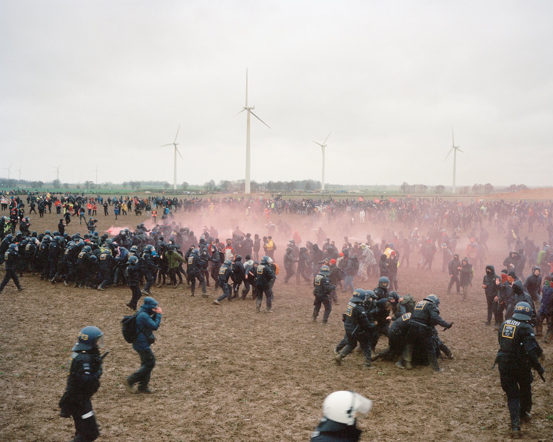 Police fend off demonstrators trying to storm the cordoned-off village of Keyenberg, Germany, during a protest march to save the village from demolition. Demonstrators estimated that around 35,000 people joined the protest, police officials said it was closer to 15,000. Keyenberg was scheduled for demolition in 2026, but was eventually saved by an agreement between energy company RWE and the German government.