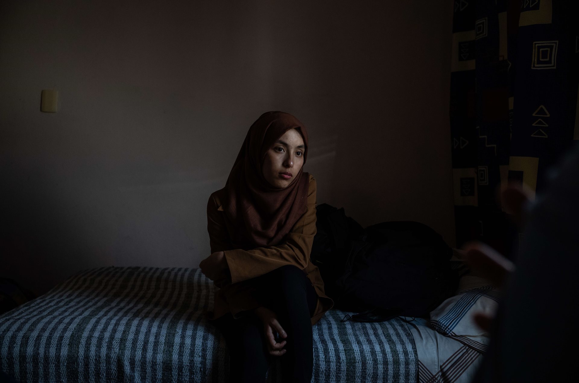 Mozhgan, an Afghan migrant, expressed her feelings while waiting in Mexico City with her family to continue their journey to the United States: &ldquo;The men can go out,&rdquo; she said, referring to life under the Taliban. &ldquo;What about us? We don&rsquo;t have life.&rdquo; Mexico City, Mexico.