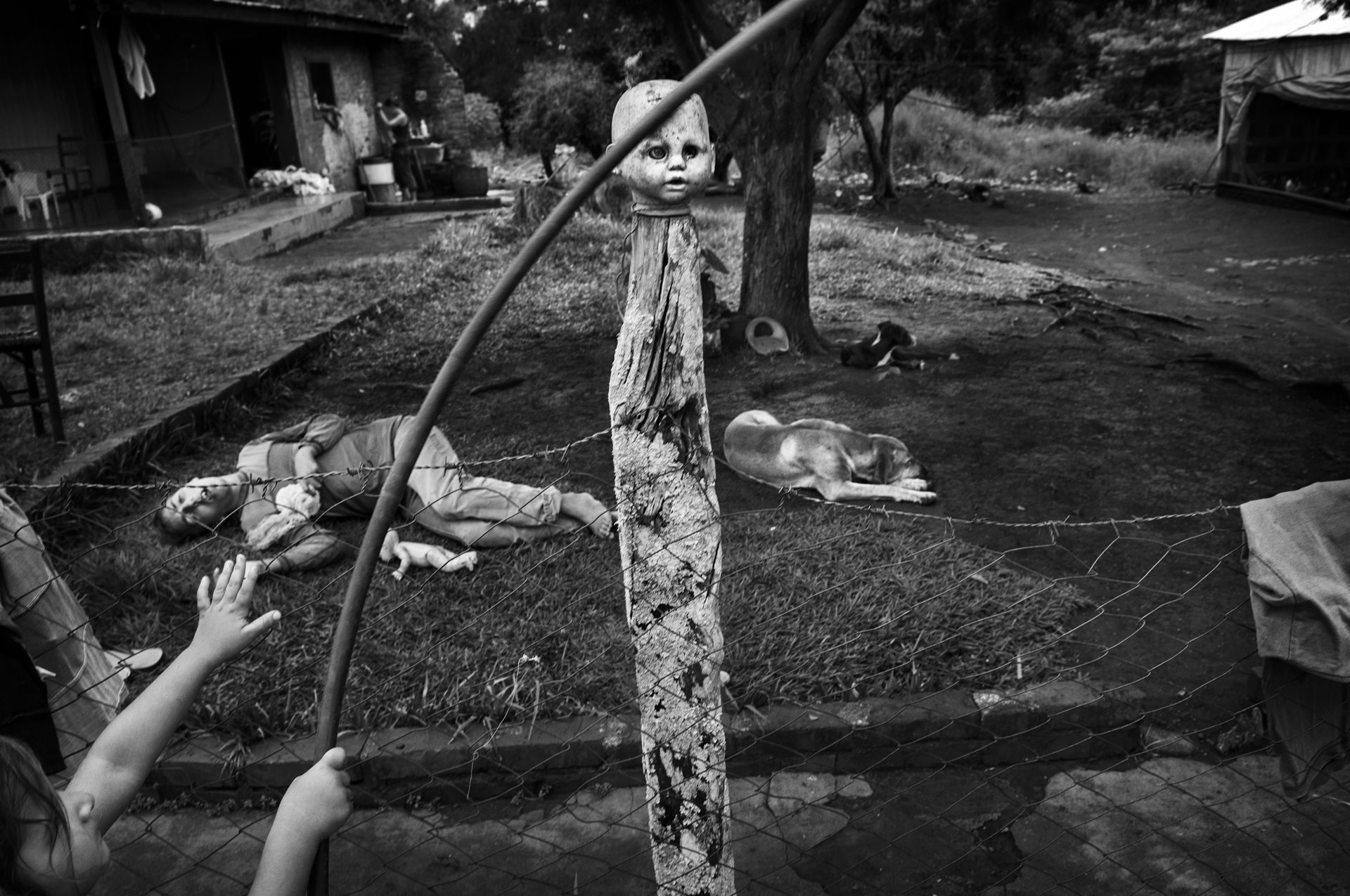 The youngest of the Gotin family (bottom left) in Misiones, Argentina. Her sister suffers from motor dysfunction and kidney failure from inhaling methyl bromide, and her brother (left) lives with mental disability.&nbsp;