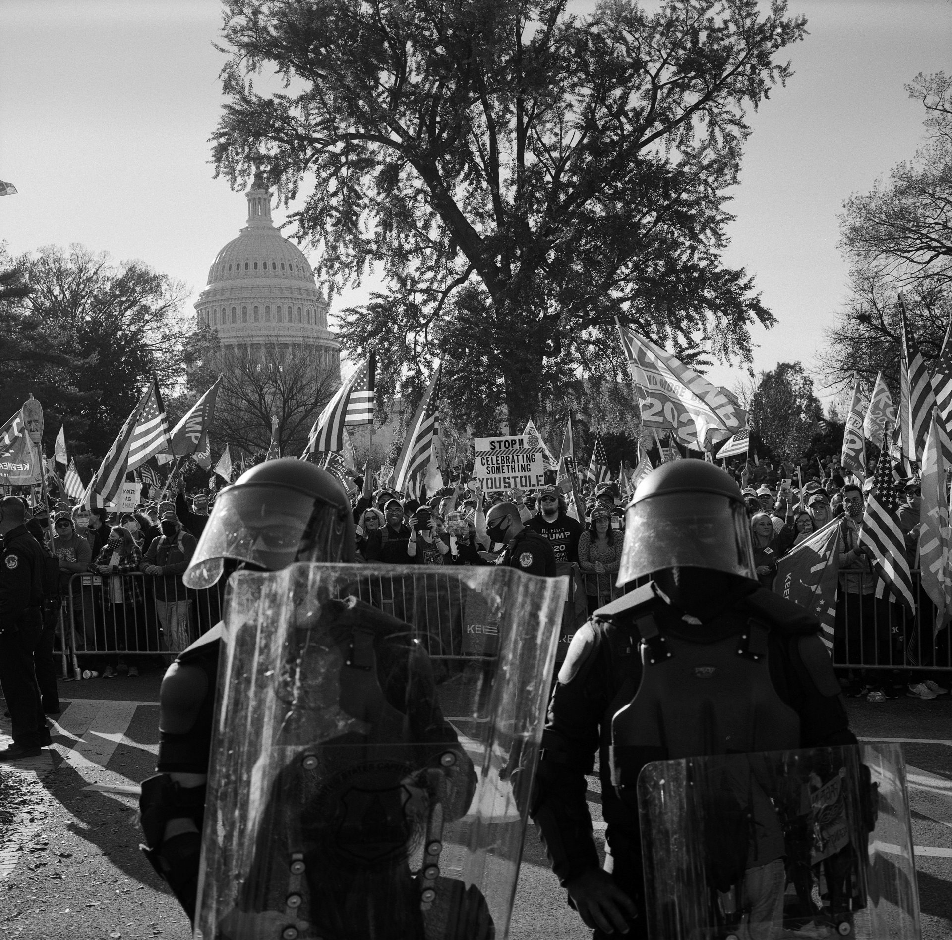 Police officers in riot gear stand between thousands of pro-Trump demonstrators and a much smaller number of counter-protesters in front of the Supreme Court, in Washington DC, USA. The &lsquo;Make America Great Again&rsquo; march, &nbsp;organized to protest the election results, was the first of two demonstrations considered to be a build up to the storming of the Capitol on 6 January 2021.