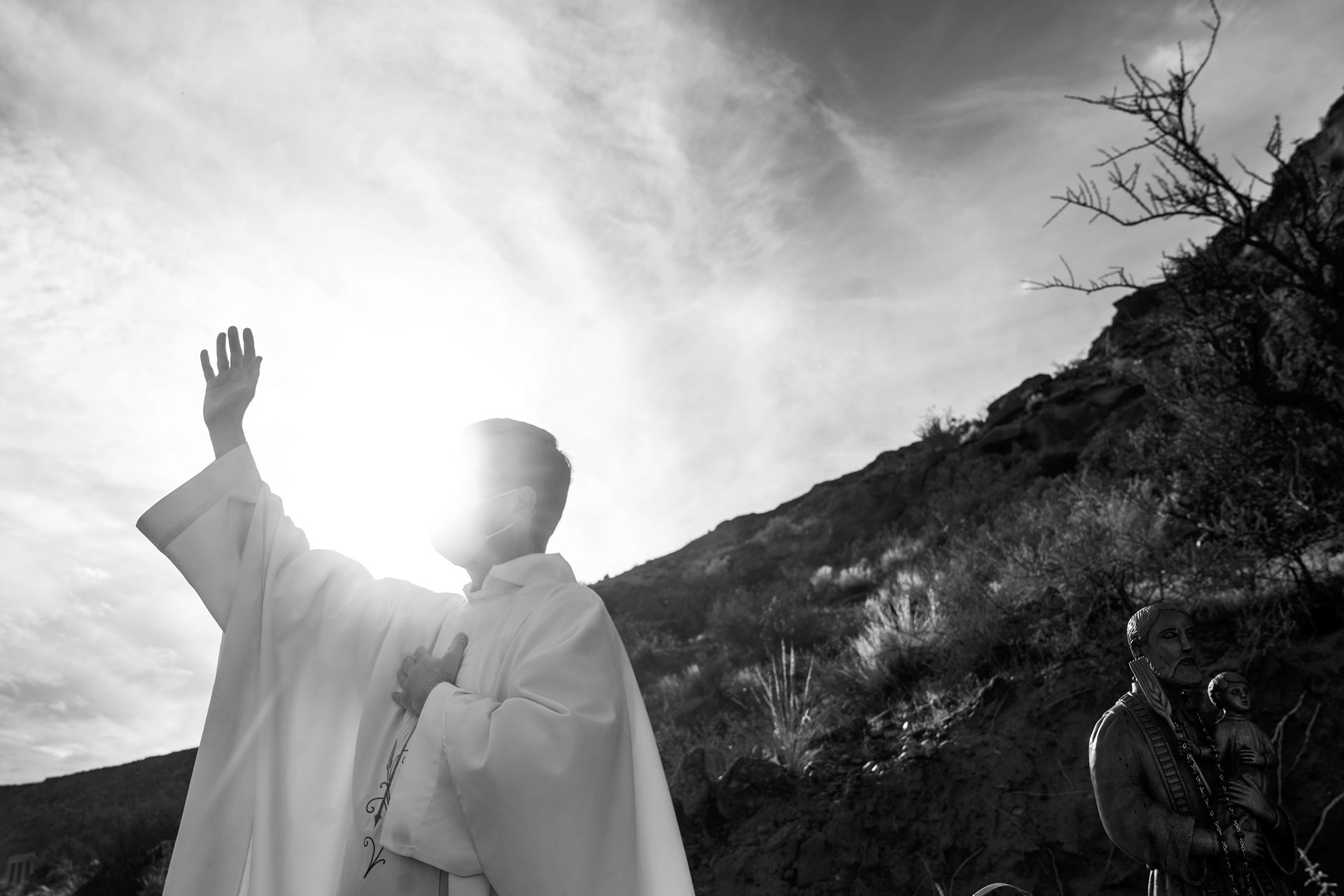 A priest preaches during a procession celebrating the feast day of San Cayetano, the Roman Catholic patron saint of labor, in Añelo, Vaca Muerta, Neuquén, Argentina. Vaca Muerta holds the second largest shale gas reserves and the fourth largest shale oil reserves in the world. The region attracts people from across the country and abroad looking for work, with a 150% rise in employment in the oil industry estimated for 2026.&nbsp;