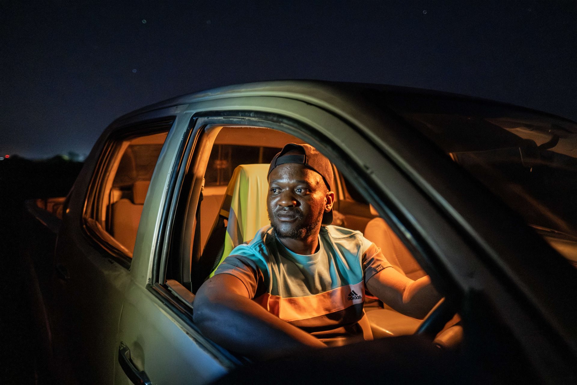 Chamunolwa Jimayi (29), a driver for the Elephant Response Team, is working hard to serve his community. The organization has tried to hire a second driver to give Jimayi a break, but none of the candidates have returned after a trial shift. Livingstone, Zambia.