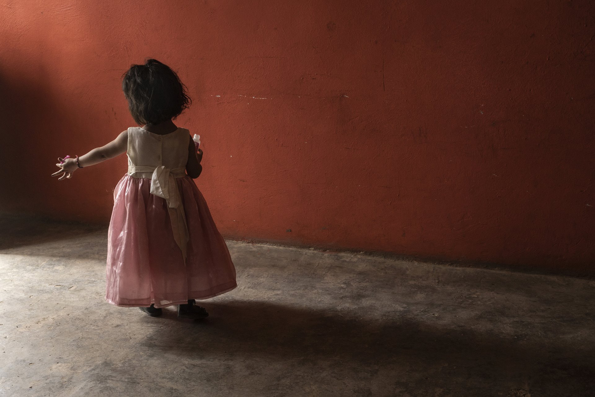 Mía plays at Don Tino&rsquo;s house in Villa Guerrero, Mexico. Mia is niece to Sebastián (pictured elsewhere), and her mother, Claudia, divides her time between taking care of Sebastián (who was born with hydrocephalus) and working in the flower fields.