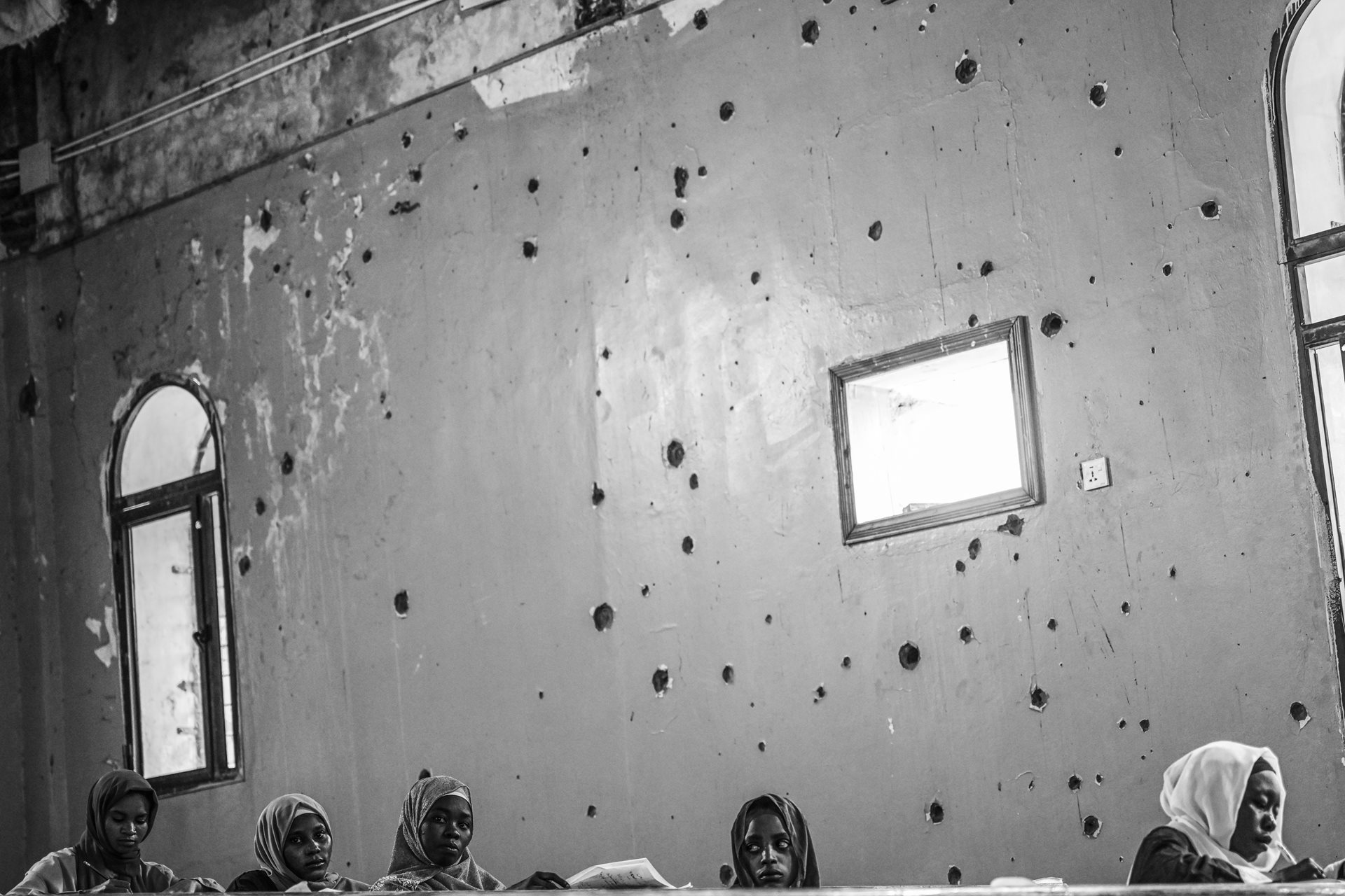 Students take exams at the war-damaged Omdurman Islamic University in Omdurman, Sudan. Schools and universities have been attacked and mostly closed since fighting began.