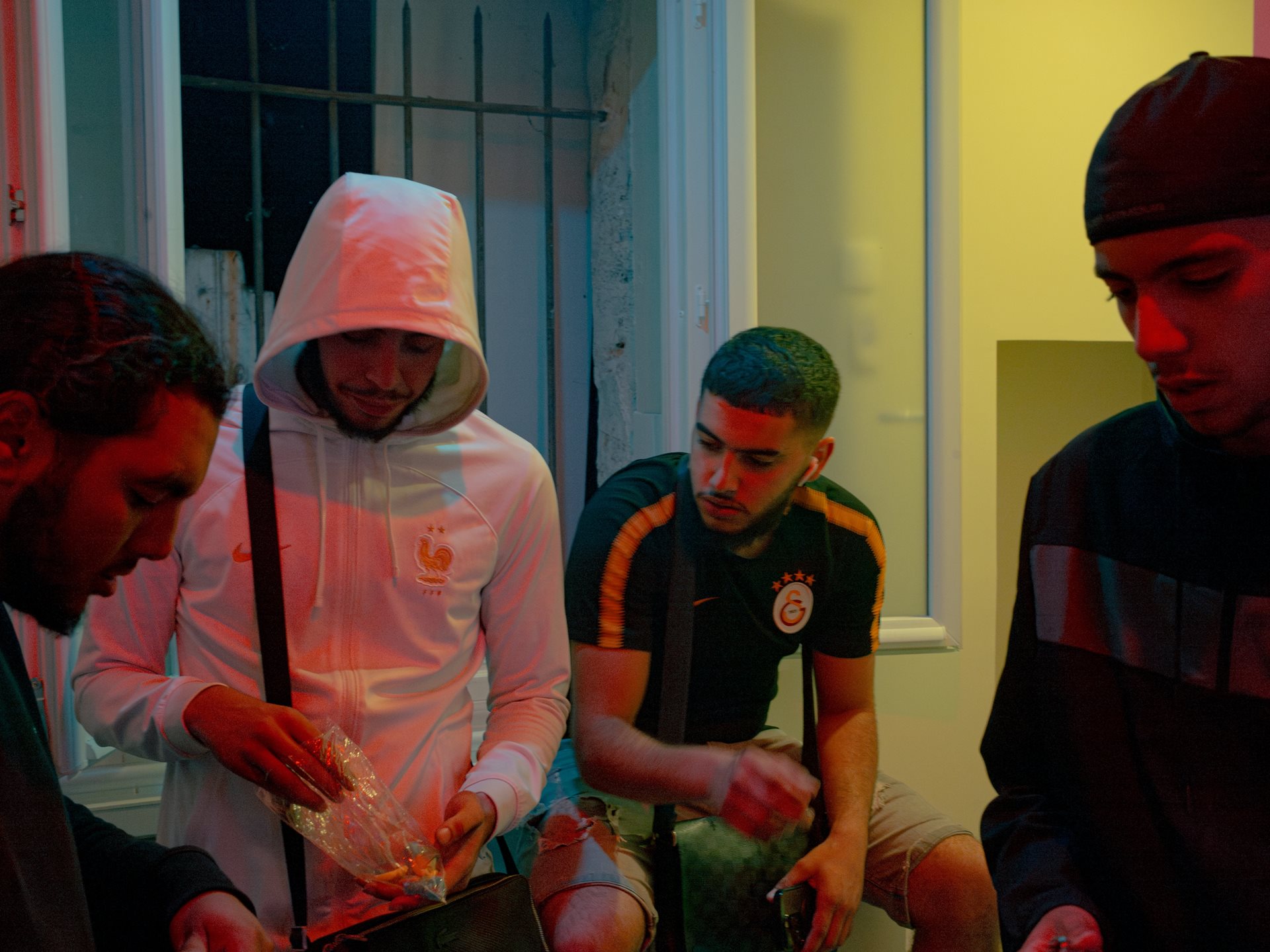 Jo (second from the right) with friends at the Clos-Saint-Lazare housing project in Stains, France.