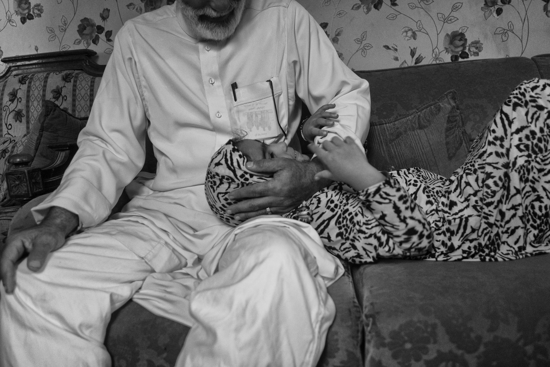 Mostafa Ghazal plays with his daughter Noor (5). The entire family developed asthma from years of exposure to the cement factory emissions. &ldquo;Seeing my daughter suffer is worse than my own pain,&rdquo; he said. Mostafa passed away in 2024. Moon Valley, Alexandria, Egypt.<br />
&nbsp;