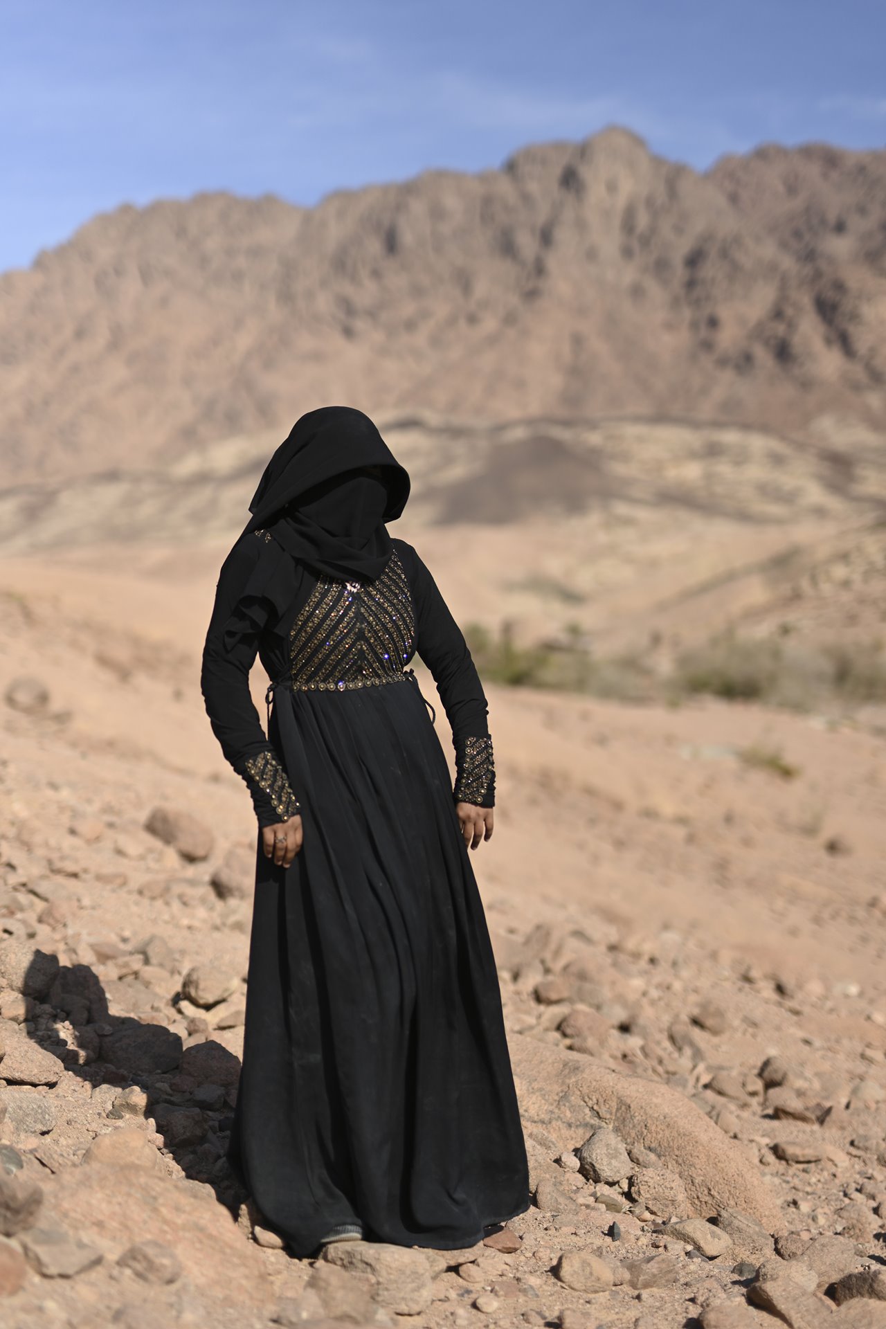 Hoda (23), who is from the city of St. Catherine, stands on the edge of a hill overlooking the Gharba Valley.&nbsp;