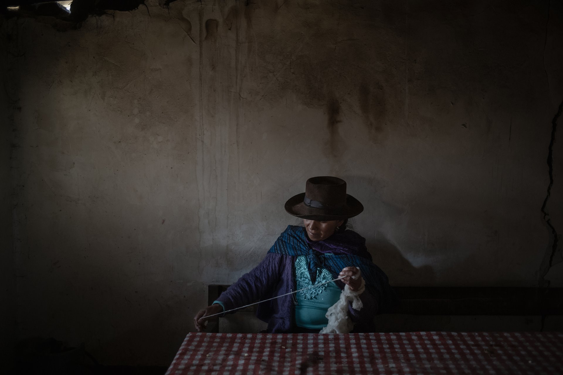 <p>Margaret Pilsen makes handmade crafts from alpaca wool, in Cusco, Peru.</p>
