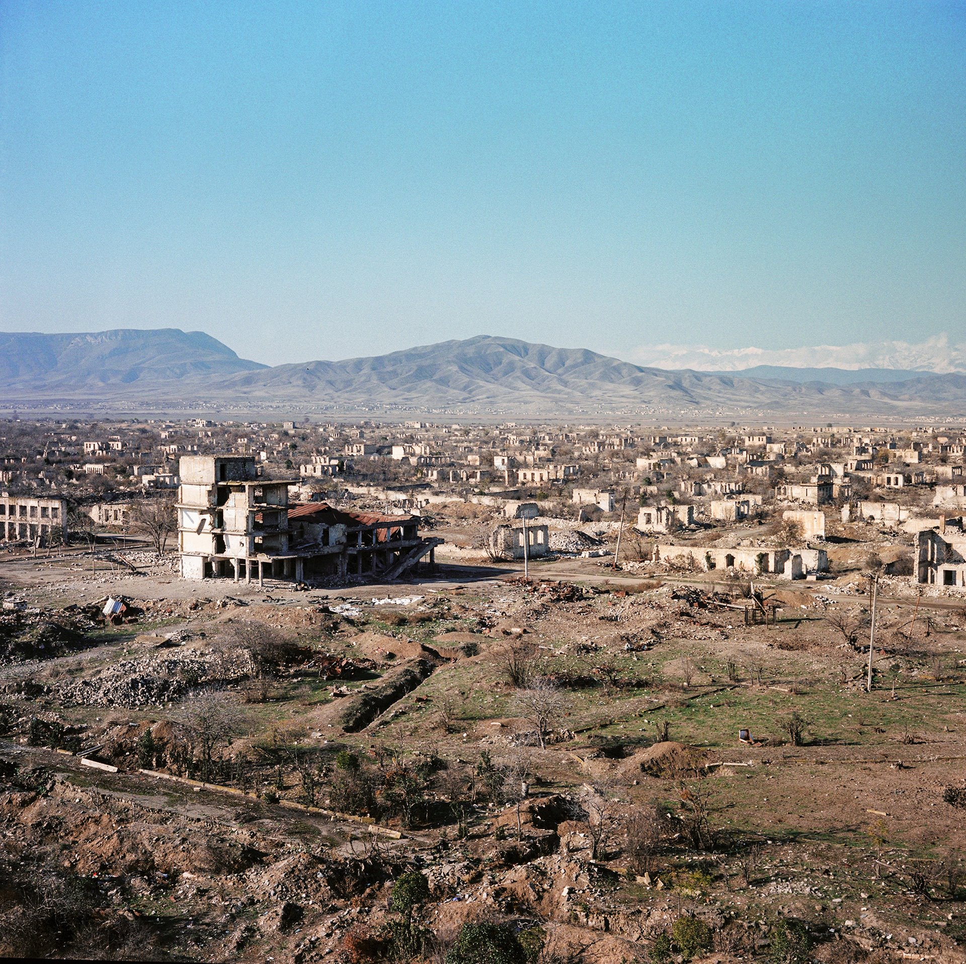 Agdam, Azerbaijan. Once a city with a population of nearly 40,000, it was systematically dismantled during thirty years of occupation by Armenian forces. Rustam Effendi regularly passed through the city on his way to Armenia to hunt butterflies in the mountains of Zangezur. Reclaimed by Azerbaijan in 2020, the city is now being cleared of landmines.