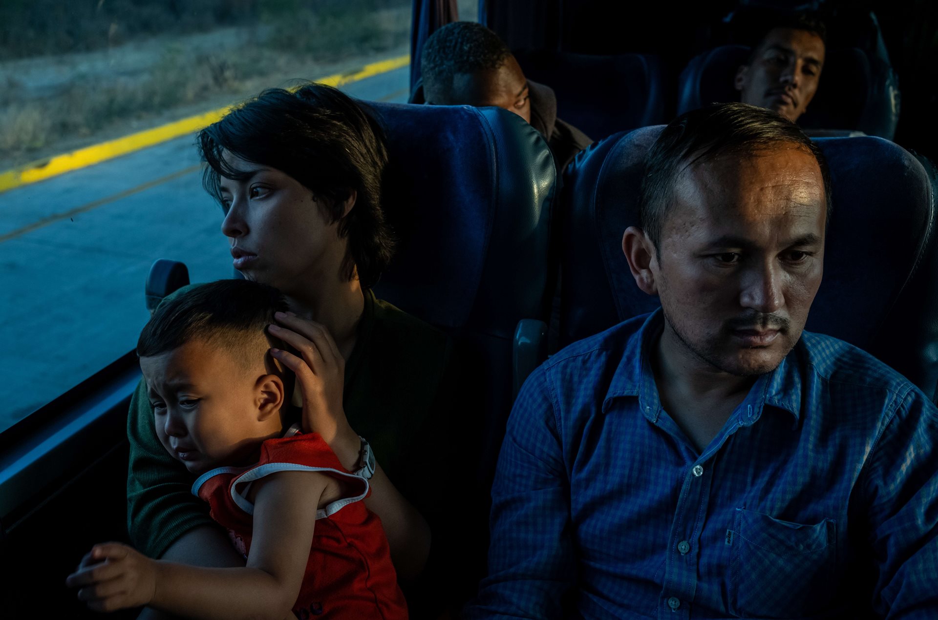 Ali, Taiba, and their son, from Afghanistan, are on a three-day bus trip, the last leg of their journey from Mexico City to Tijuana, where they will cross the border into the United States. Tepic, Mexico.
