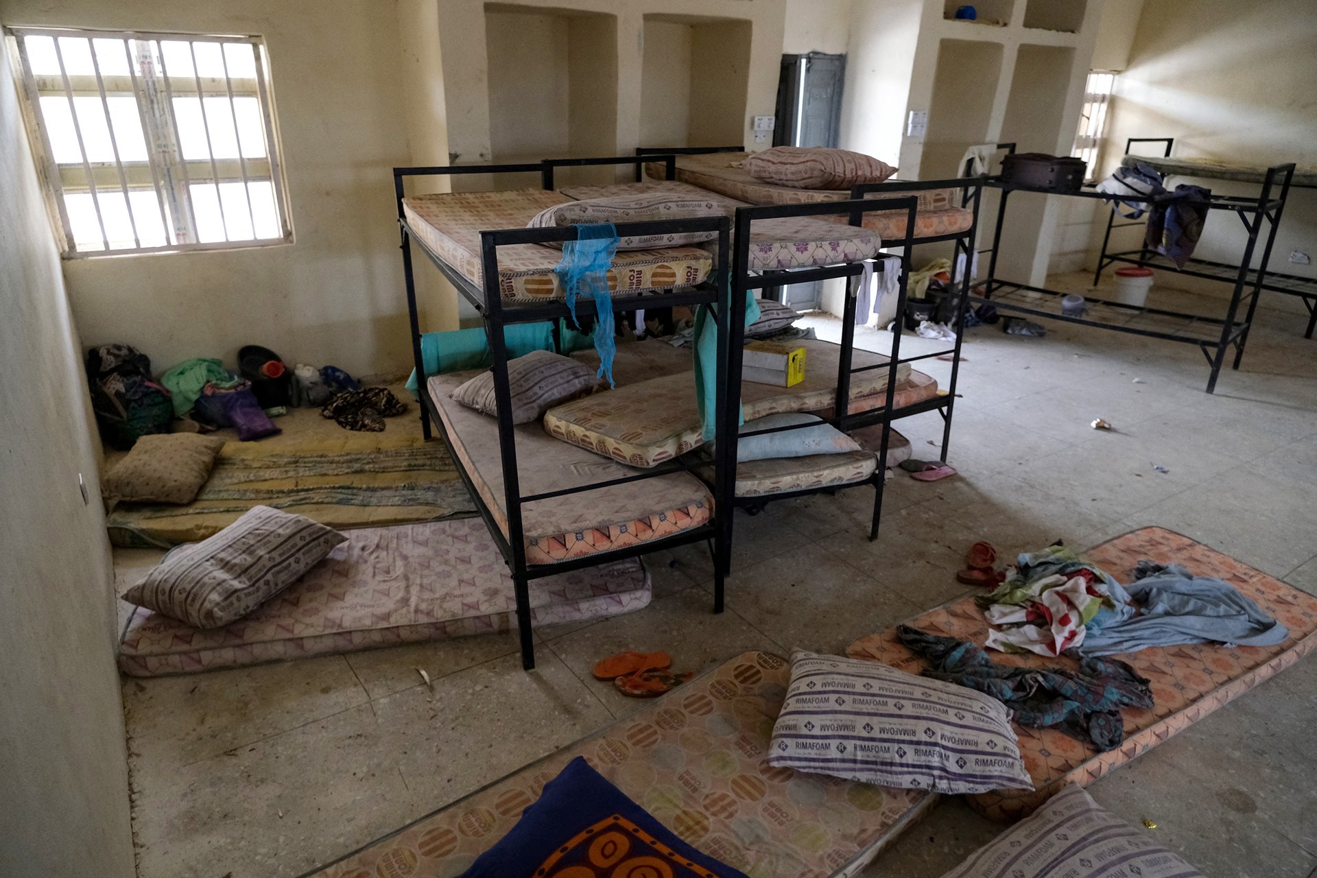 <p>A dormitory lies empty at the Government Girls Secondary School, Jangebe, Zamfara State, northwest Nigeria, on 27 February 2021. Gunmen, apparently from a bandit group, kidnapped 279 girls from dormitories at the school in the middle of the previous night.</p>
