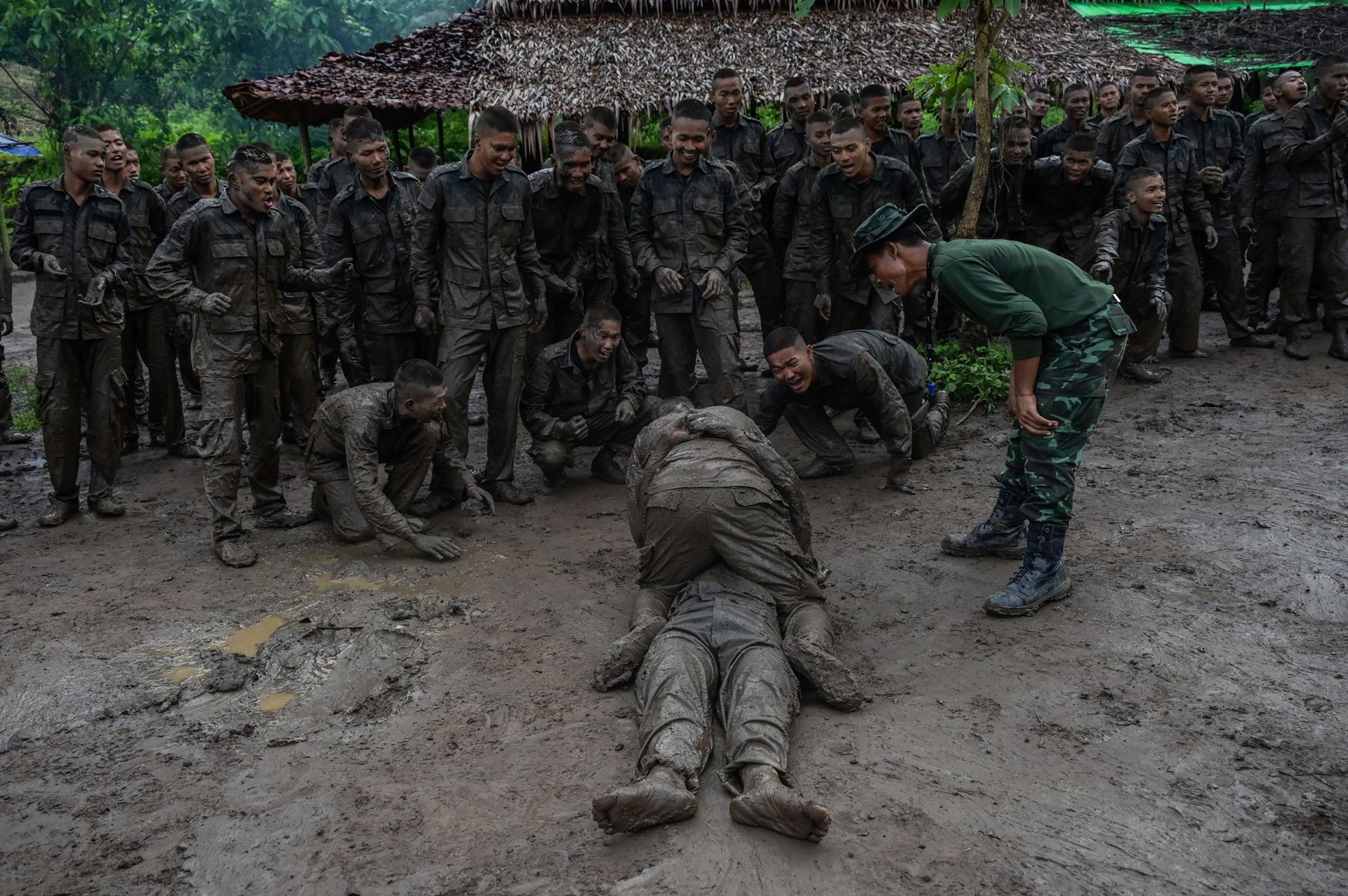 PDF recruits undergo training at a jungle camp in Kayin State, Myanmar, near the Thailand-Myanmar border. The PDF experienced a surge in volunteers in reaction to a February 2024 junta decree mandating conscription of men and women over 18 years old into the national military.