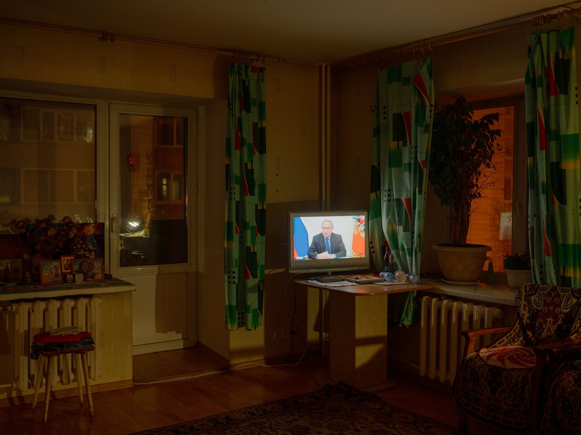 Since Aliona&rsquo;s grandmother very rarely leaves her house in Tomsk, Russia, television (here broadcasting an address by President Putin) is often her window to the world.