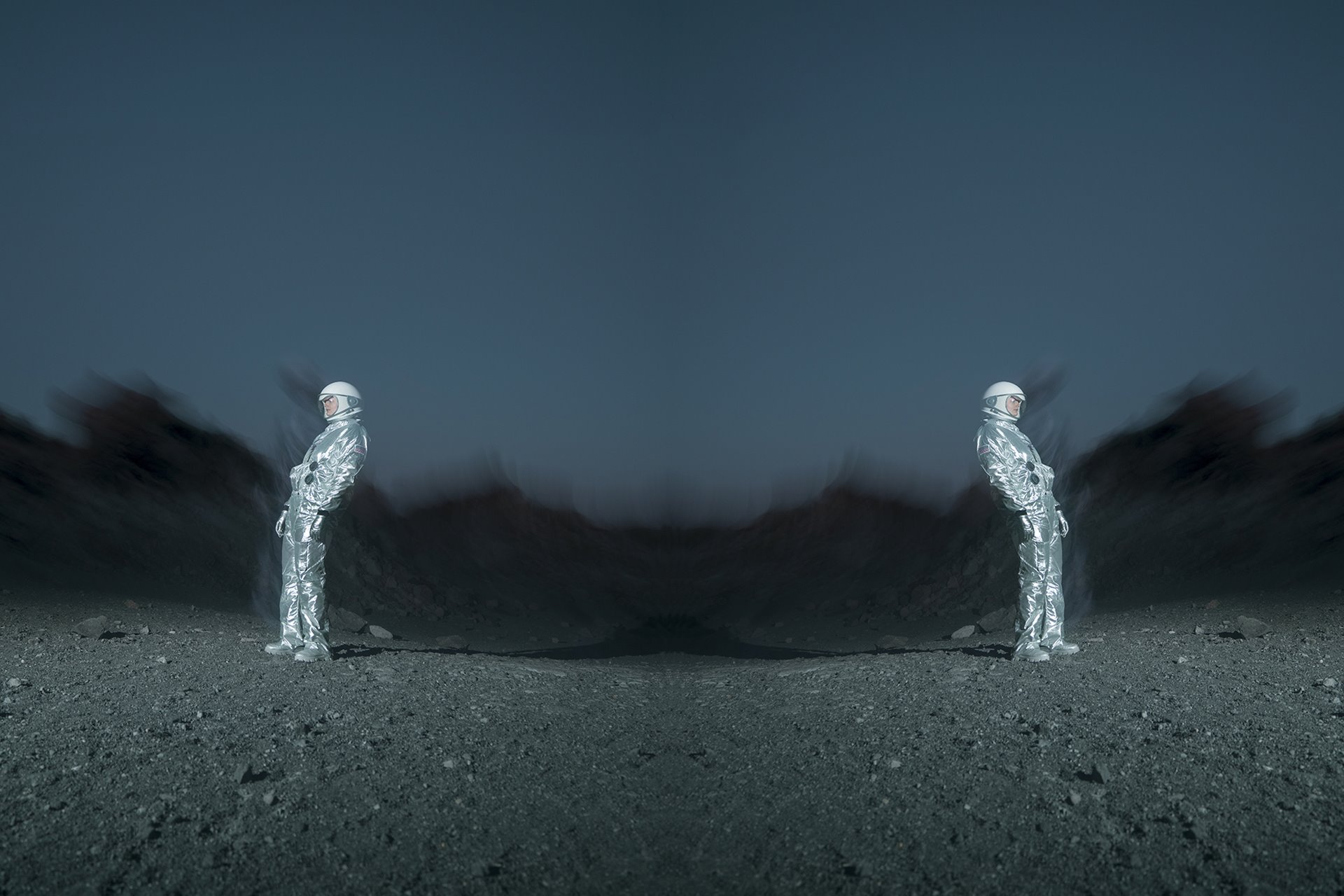 A fictional Gay Space Agency astronaut on the moon. The image is mirrored and warped to evoke the Rorschach inkblot test, one of two &lsquo;heterosexuality tests&rsquo; that astronauts in NASA&rsquo;s Mercury, Gemini, and Apollo programs were required to take. Obsidian Dome, Mono County, California.