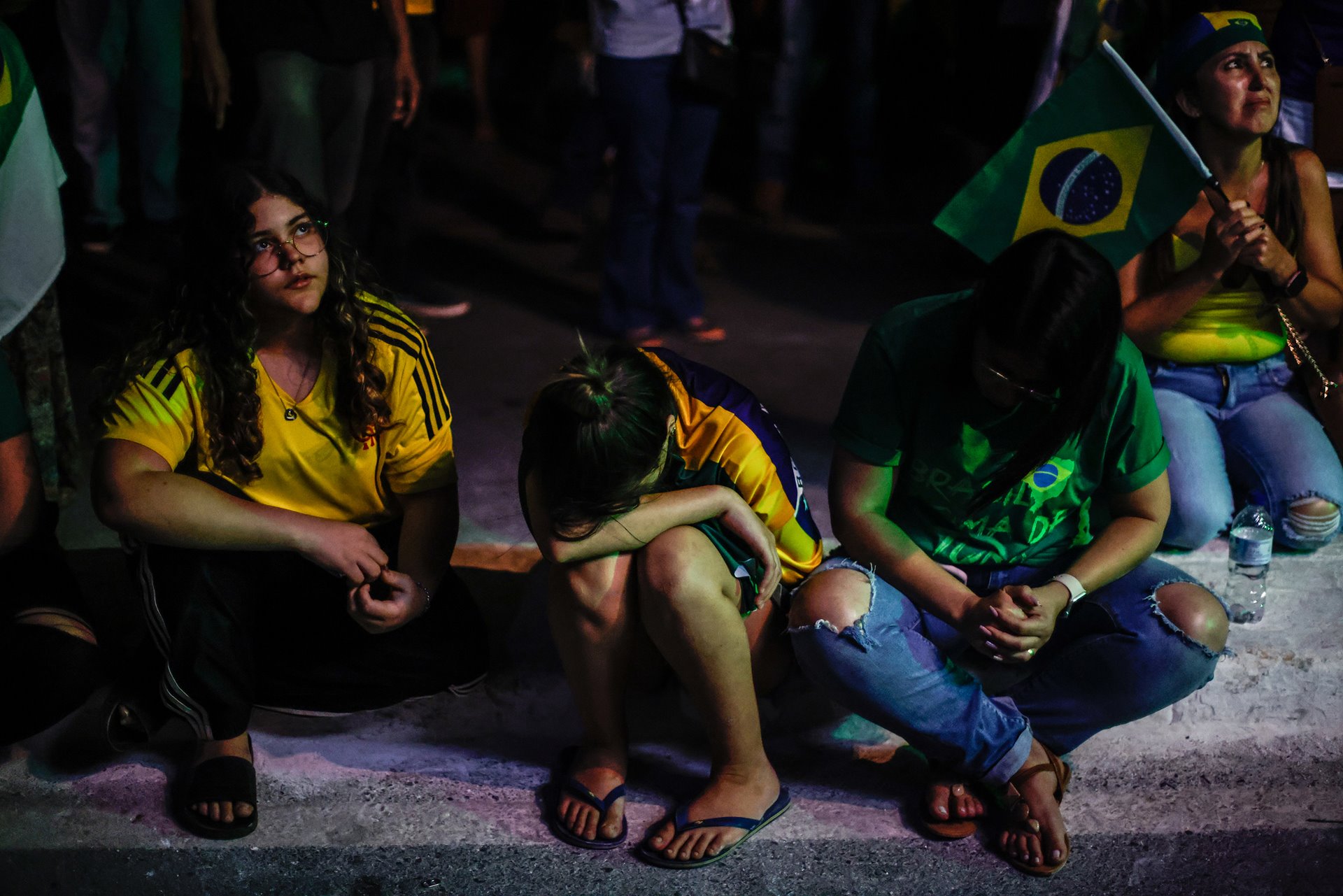Bolsonaro supporters in disbelief after his defeat, in The Monumental Axis, Brasilia, Brazil. &nbsp;Jair Bolsonaro was defeated in a runoff by former president Luiz Inácio Lula da Silva by an extremely narrow margin. Lula received 50.90% of the votes and Bolsonaro, 49.10%, the smallest difference ever recorded in Brazilian history since 1989, when the country returned to hold free elections for the presidency of the Republic after redemocratization.&nbsp;