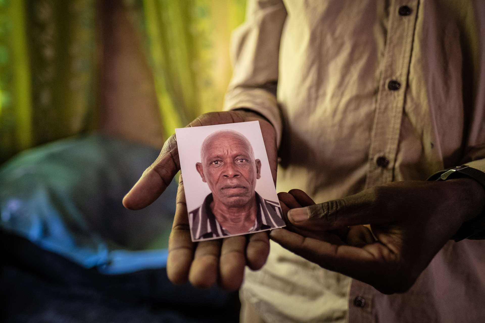Luka Chiyesu (39) holds a photo of his father, Luka Makongo Chiyesu (91), who was killed by an elephant. &ldquo;We used to live peacefully. Nobody was ever attacked by elephants,&rdquo; says Luka Jr. &ldquo;Things have changed a lot. When they see us, they see an enemy. When we see them, we see an enemy.&rdquo; Livingstone, Zambia.