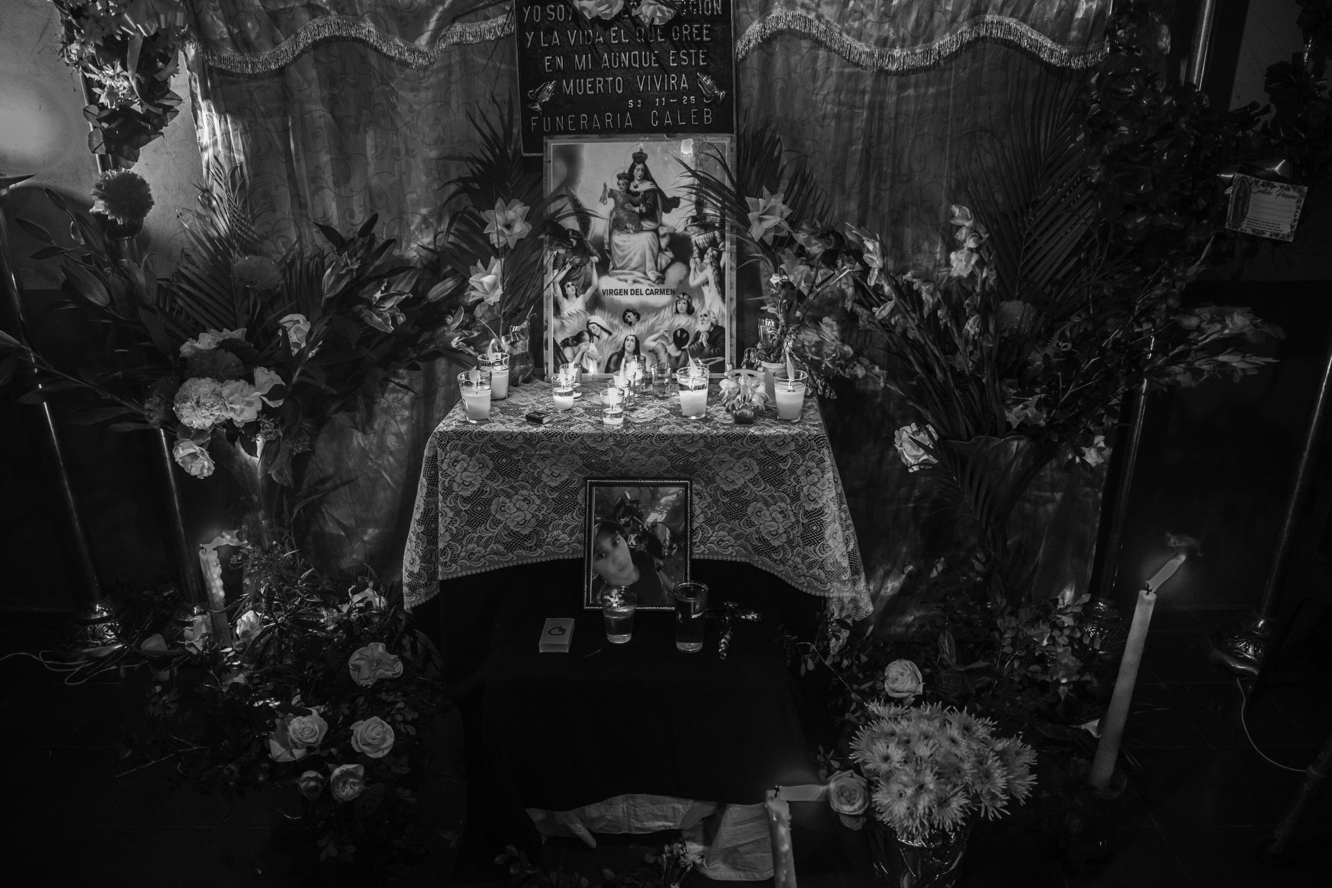 An altar in honor of Juan Castillo, an employee at the Ministry of Public Works for the government of El Salvador. He spent two years in prison after being arrested under the &ldquo;state of emergency.&rdquo; He died on 13 October 2024 at the age of 32. La Libertad, El Salvador.