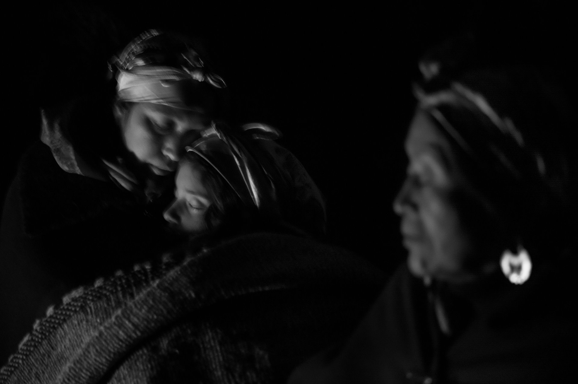 A mother and daughter participate in a We Tripantu ceremony, the Mapuche New Year, celebrated over the Southern winter solstice, in Río Bueno, Los Ríos, Chile. After the shortest day of the year, the sun begins to approach the earth again, representing a new cycle of nature.