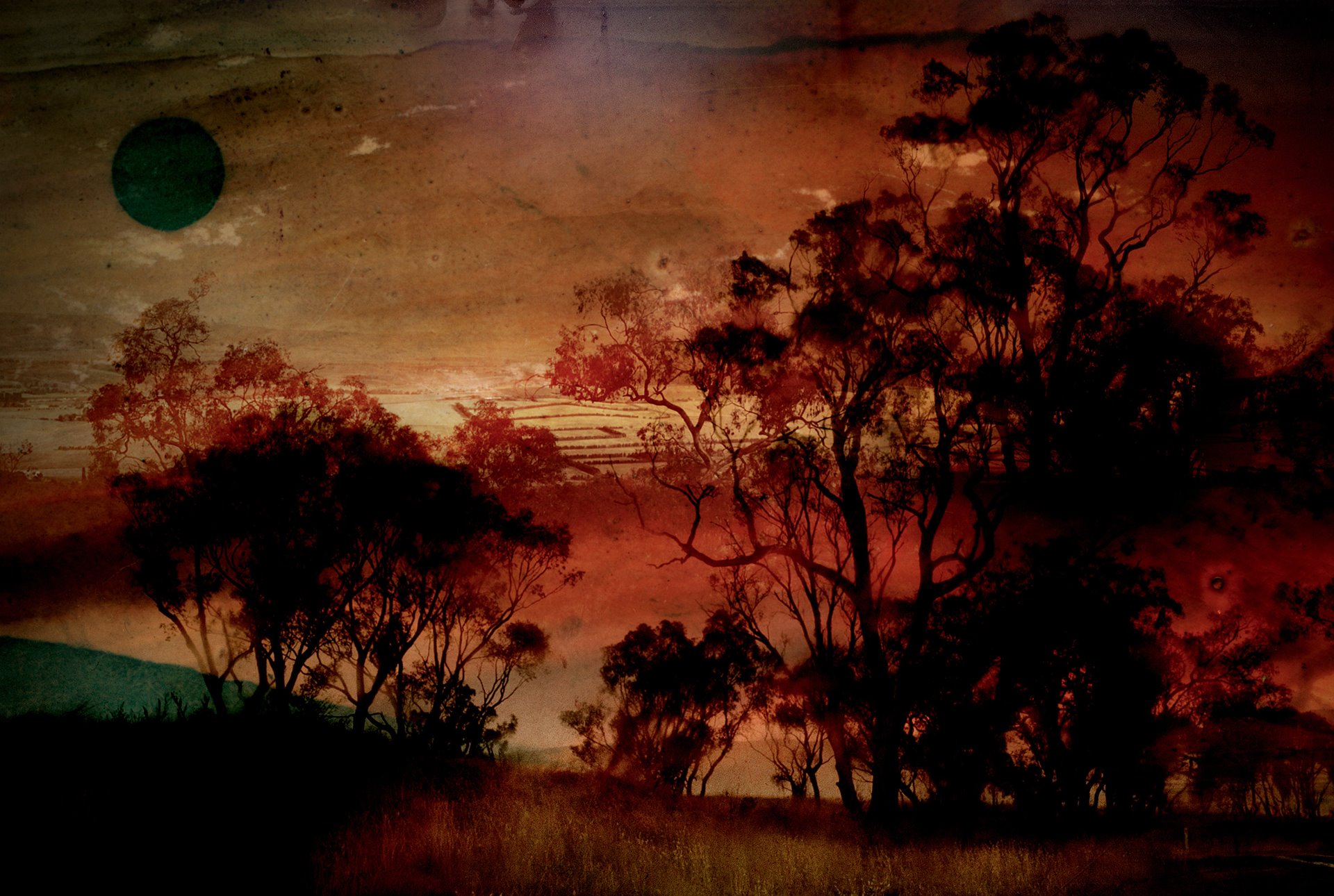 Landscape photograph taken in New South Wales and painted with coloured inks and paints by the photographer. Outskirts of Bathurst (Wiradjuri Country), Australia.
