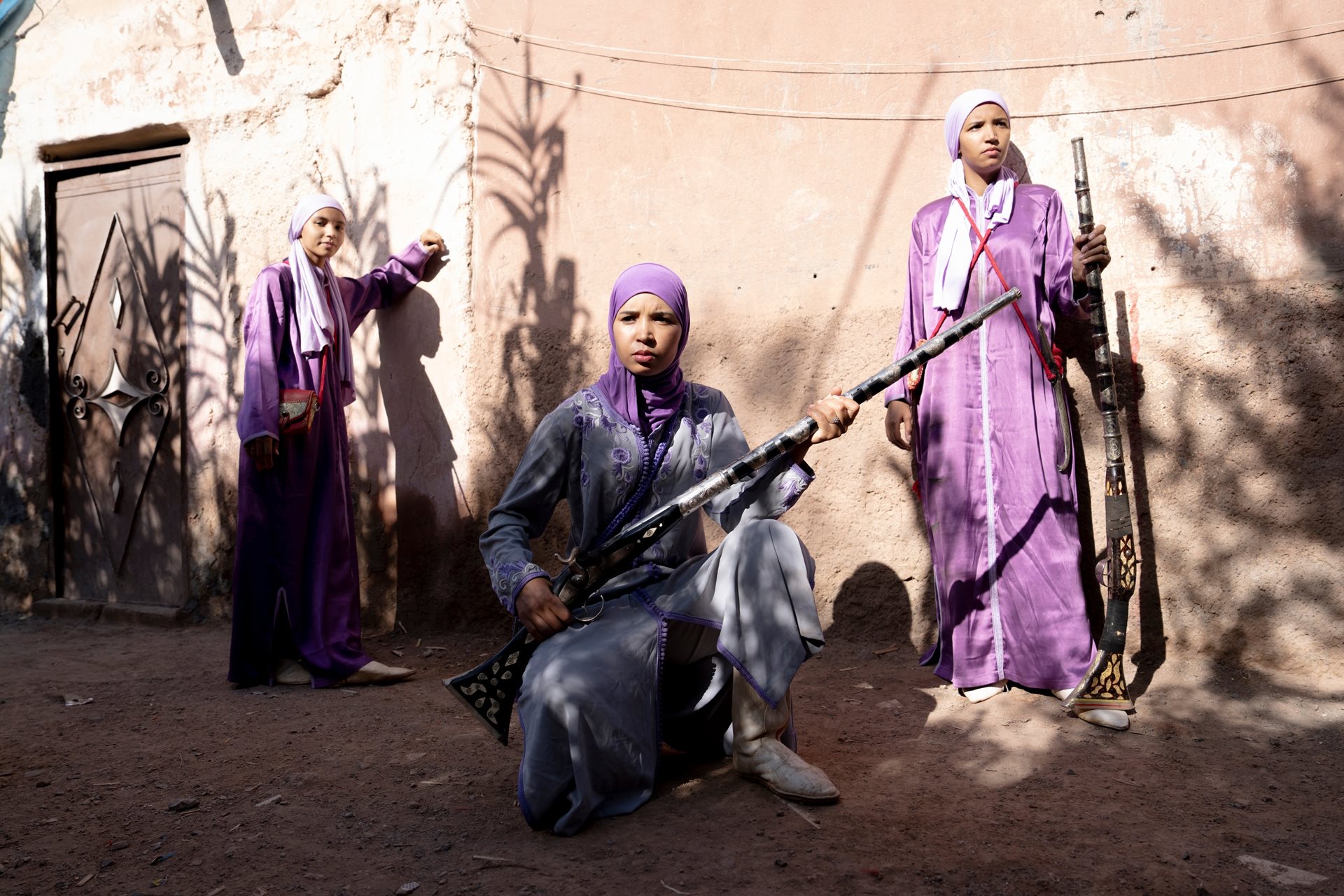 Hanane Talid and her sisters in traditional Tbourida garments, echoing the warriors who used the performance to intimidate invaders. Marrakesh, Morocco.<br />
&nbsp;