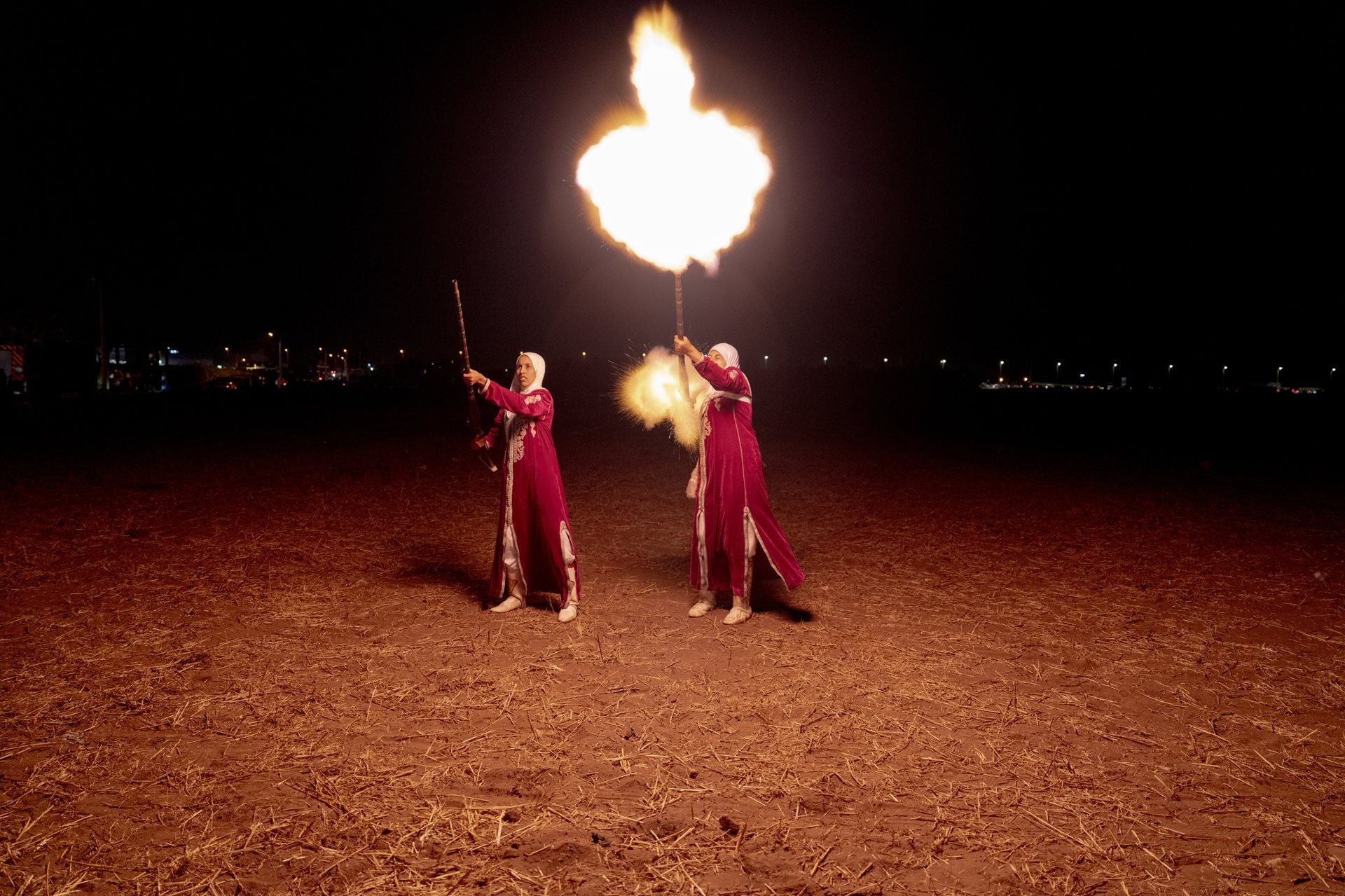 <p dir="ltr">Two riders unload rifles that failed during the performance, a necessary safety measure to ensure no gunpowder remains inside, in Sidi Rahal, Morocco.</p>
