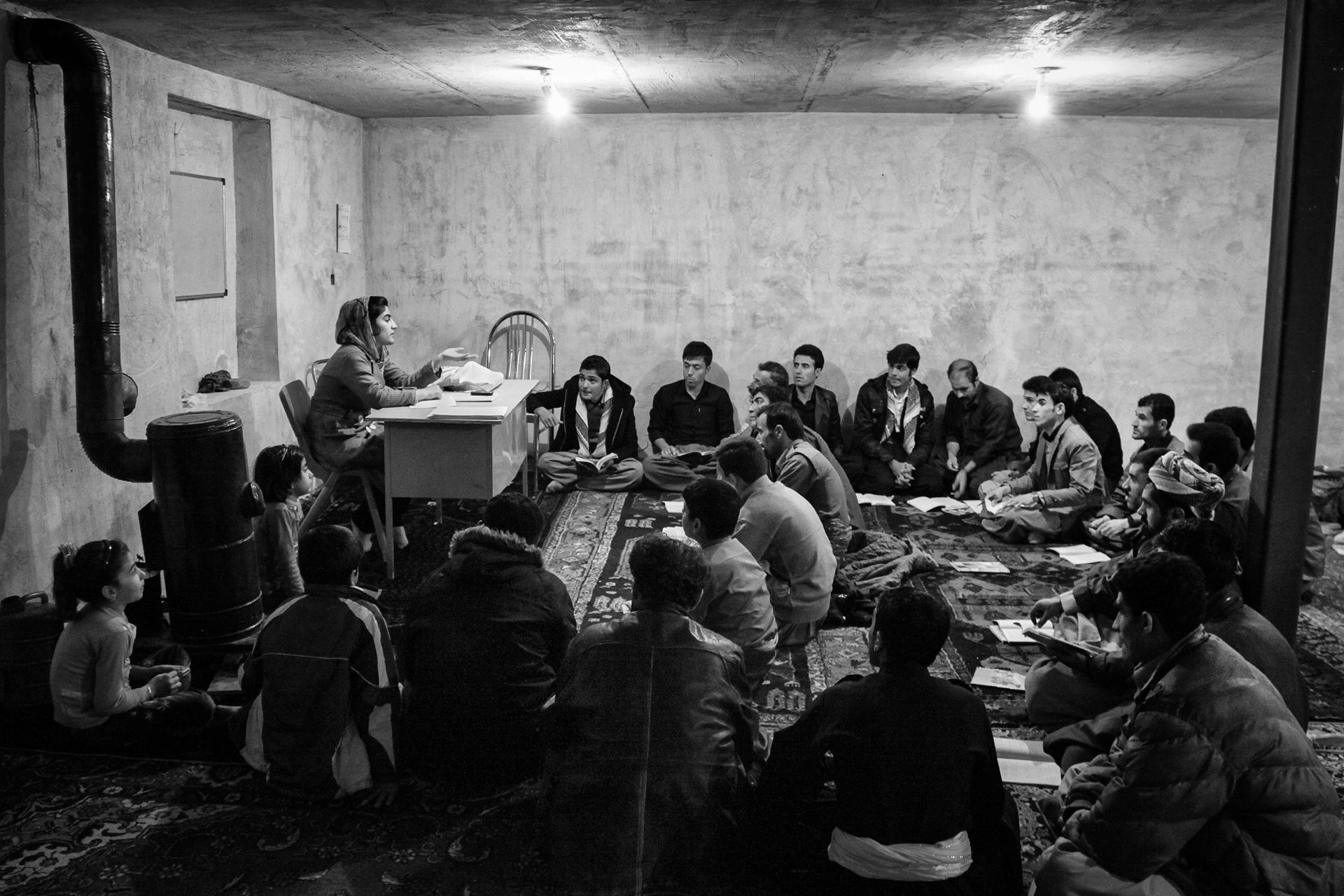 Susan (18) teaches Kurdish in a remote border village, in Kurdistan, Iran. Teaching Kurdish in schools is banned, but volunteers help preserve the language by teaching people to read and write.