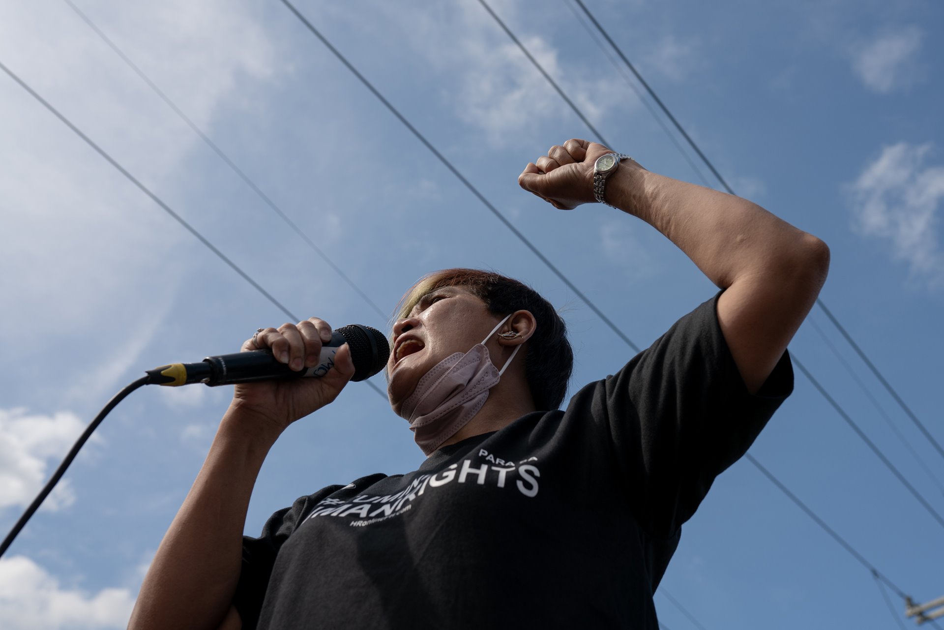 Nanette Castillo speaks on a makeshift stage during a Human Rights Day protest in Quezon City, the Philippines. Since her son&rsquo;s murder by unidentified suspects in 2017, she has transformed her grief to activism, volunteering for advocacy groups and participating in protests against such killings.