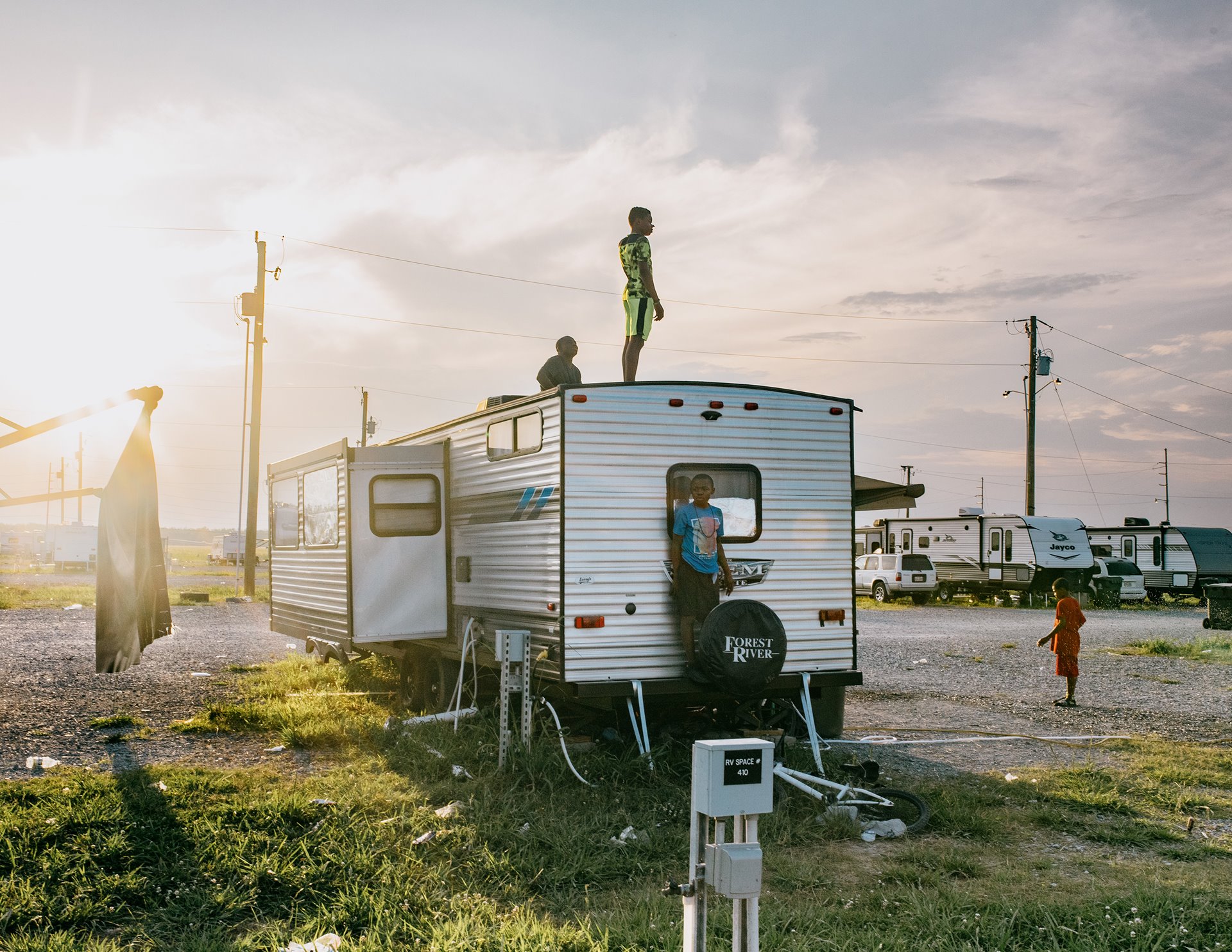 A few kilometers from the subdivision for residents resettled from Isle de Jean-Charles, nine members of the Charles family live in a caravan provided by the Louisiana state authorities for people left homeless after Hurricane Ida. The disaster housing facility known as the Ida Shelter Park was scheduled to close on June 1, 2023, and the Charles family had to leave. Gray, Louisiana, United States.