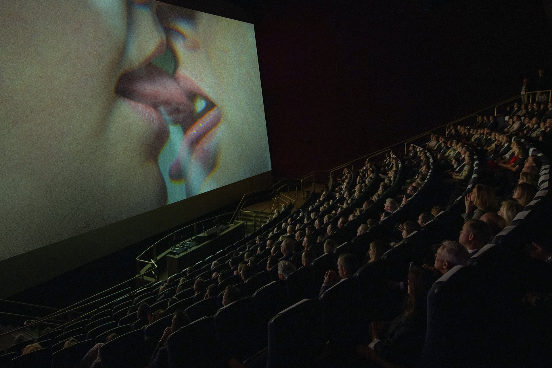 A manipulated NASA archival image of a film screening at the National Air and Space Museum in Washington, DC, United States. The screen has been replaced with an image of two women kissing.&nbsp;