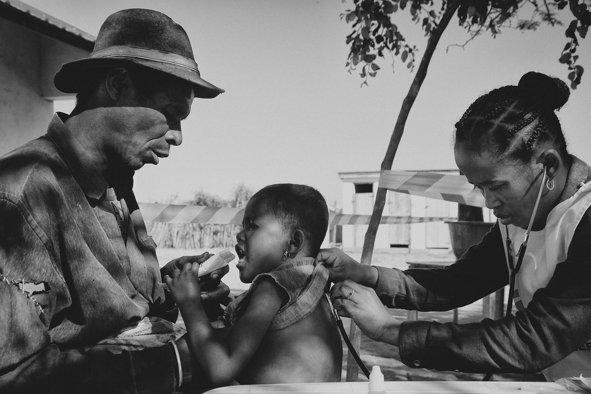 Satinompeo (5), accompanied by her father, Fitamantsoa, has an urgent consultation with Dr Lina Soatineza at a Médecins Sans Frontières (MSF) mobile clinic in the village of Befeno, in Marovato, Madagascar. Satinompeo weighs only 11kg and shows signs of severe malnutrition. &nbsp;Since June 2021, MSF has operated such clinics in the region to treat malnutrition, to help combat a food crisis brought on by several months of drought since decades.